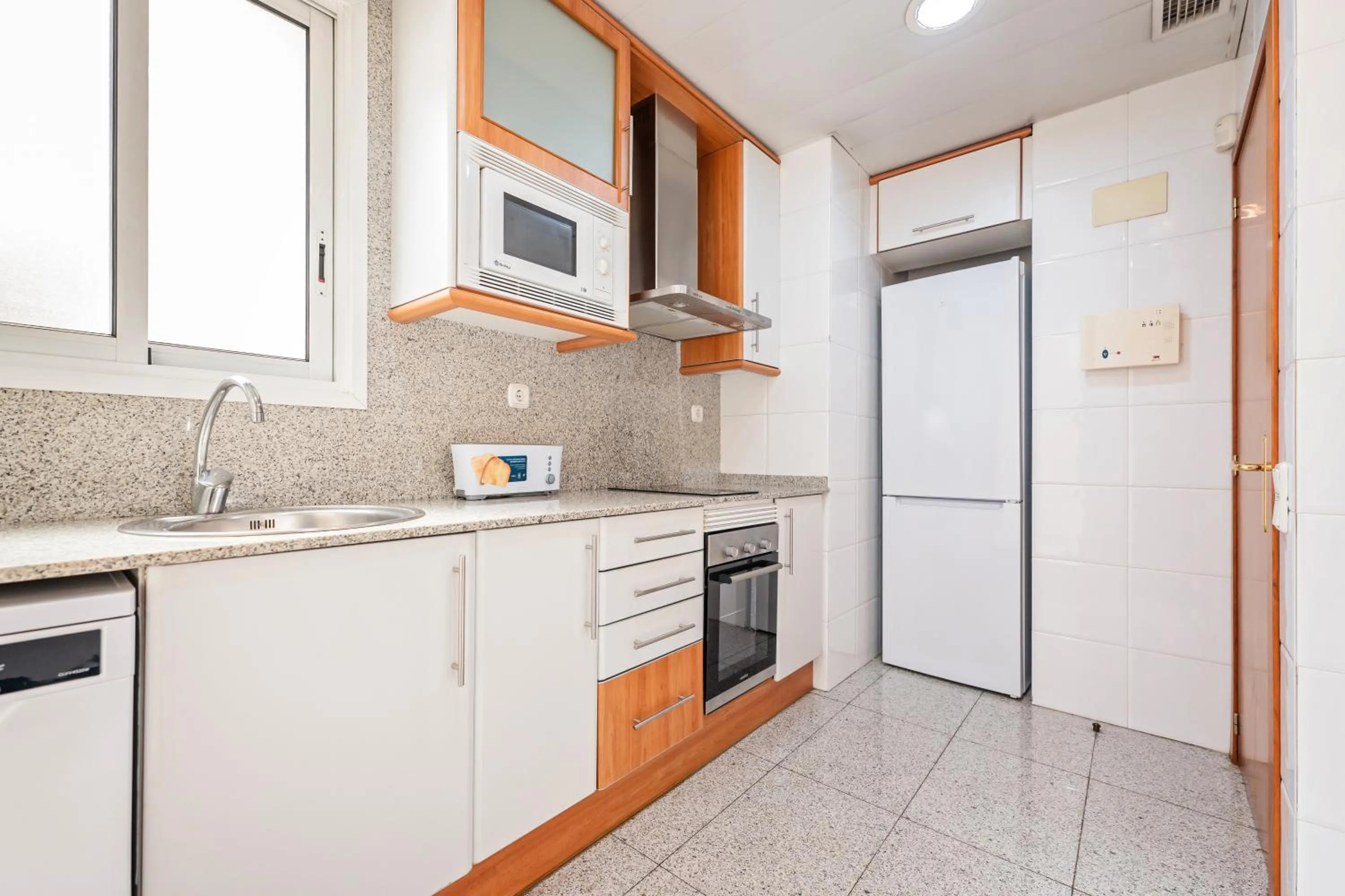 Kitchen or kitchenette in Apartaments Marina - Abapart