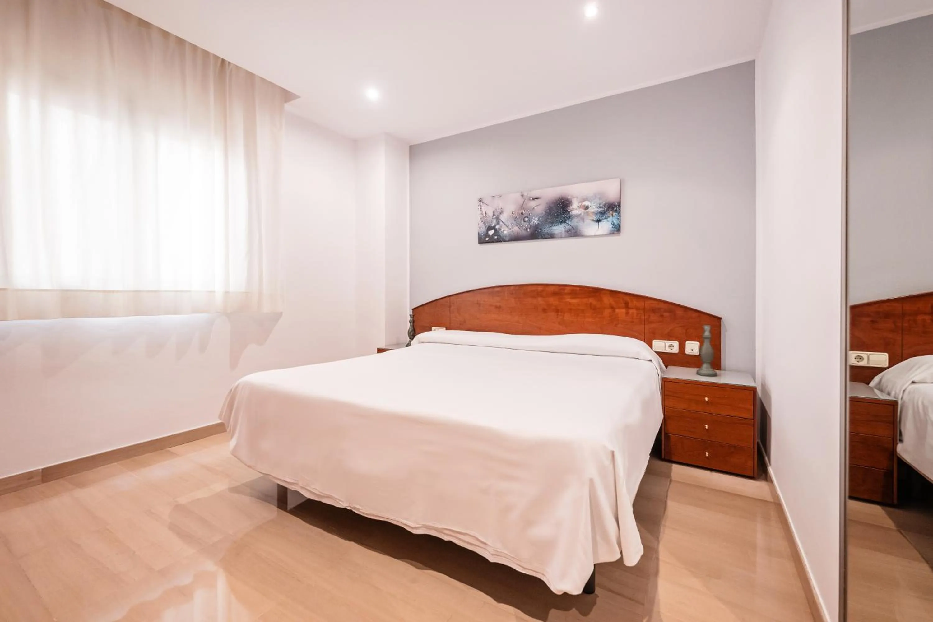 Bed in Aparthotel Napols - Abapart