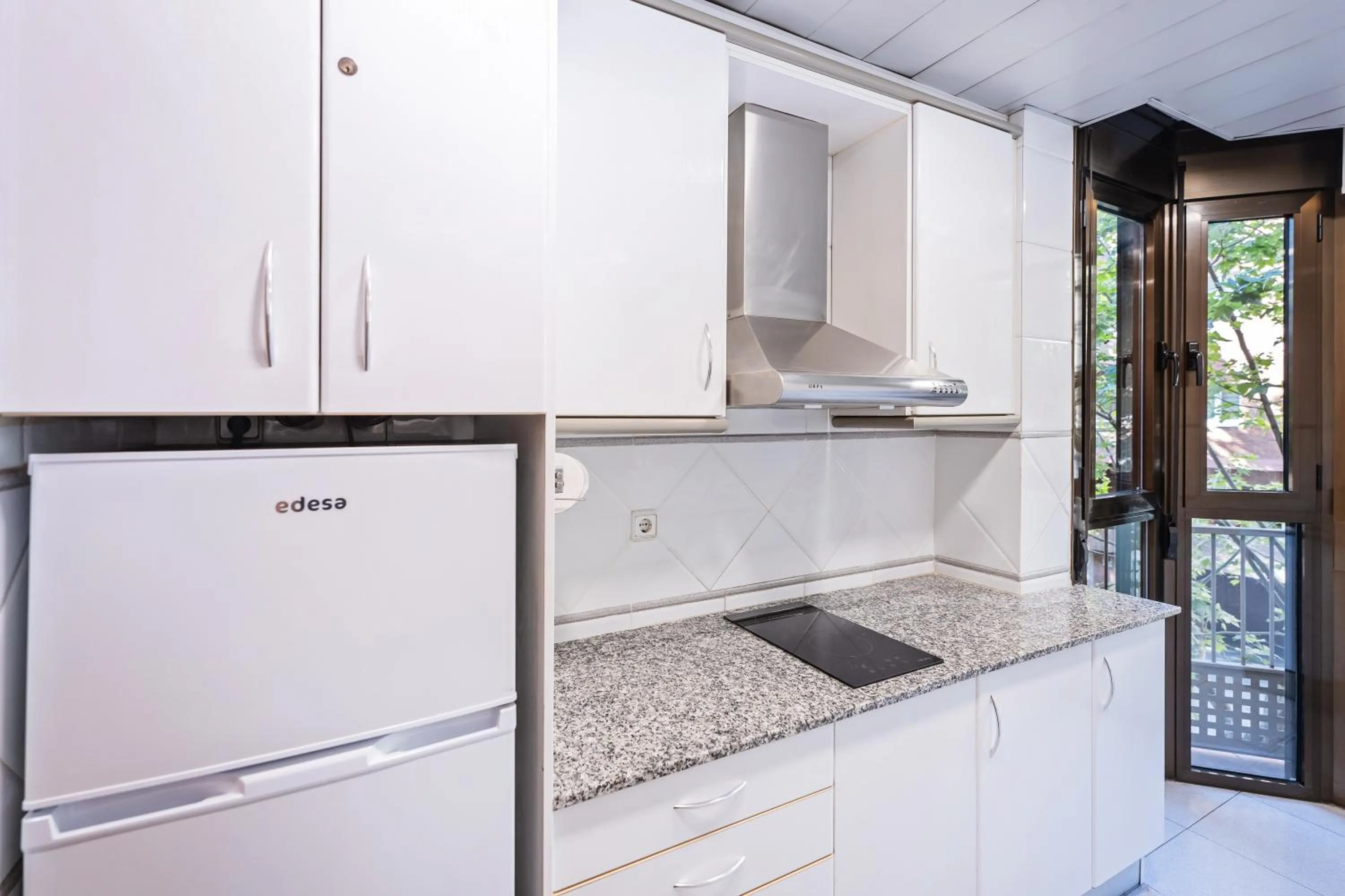 Kitchen or kitchenette in Aparthotel Napols - Abapart