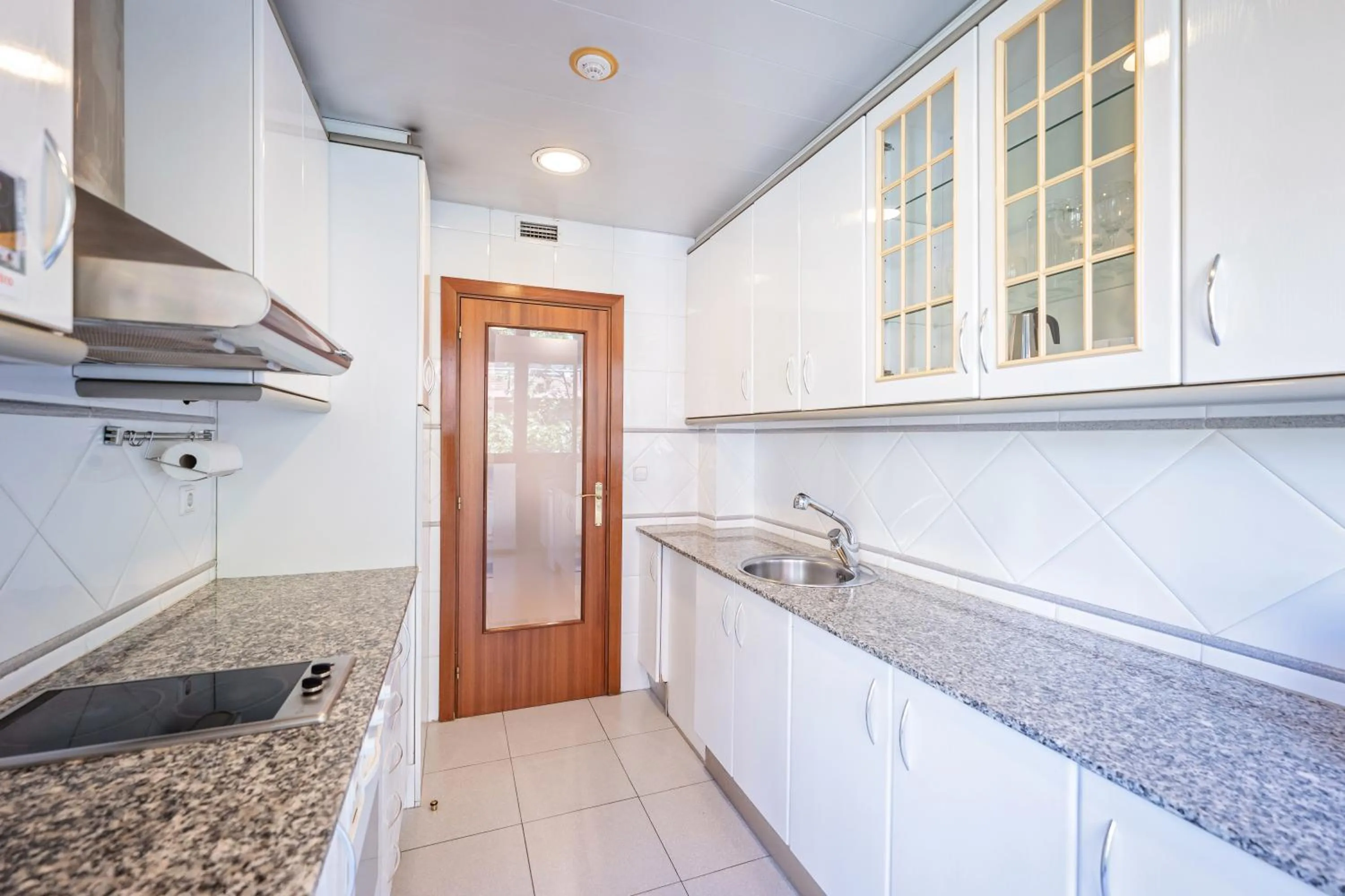 Kitchen or kitchenette in Aparthotel Napols - Abapart