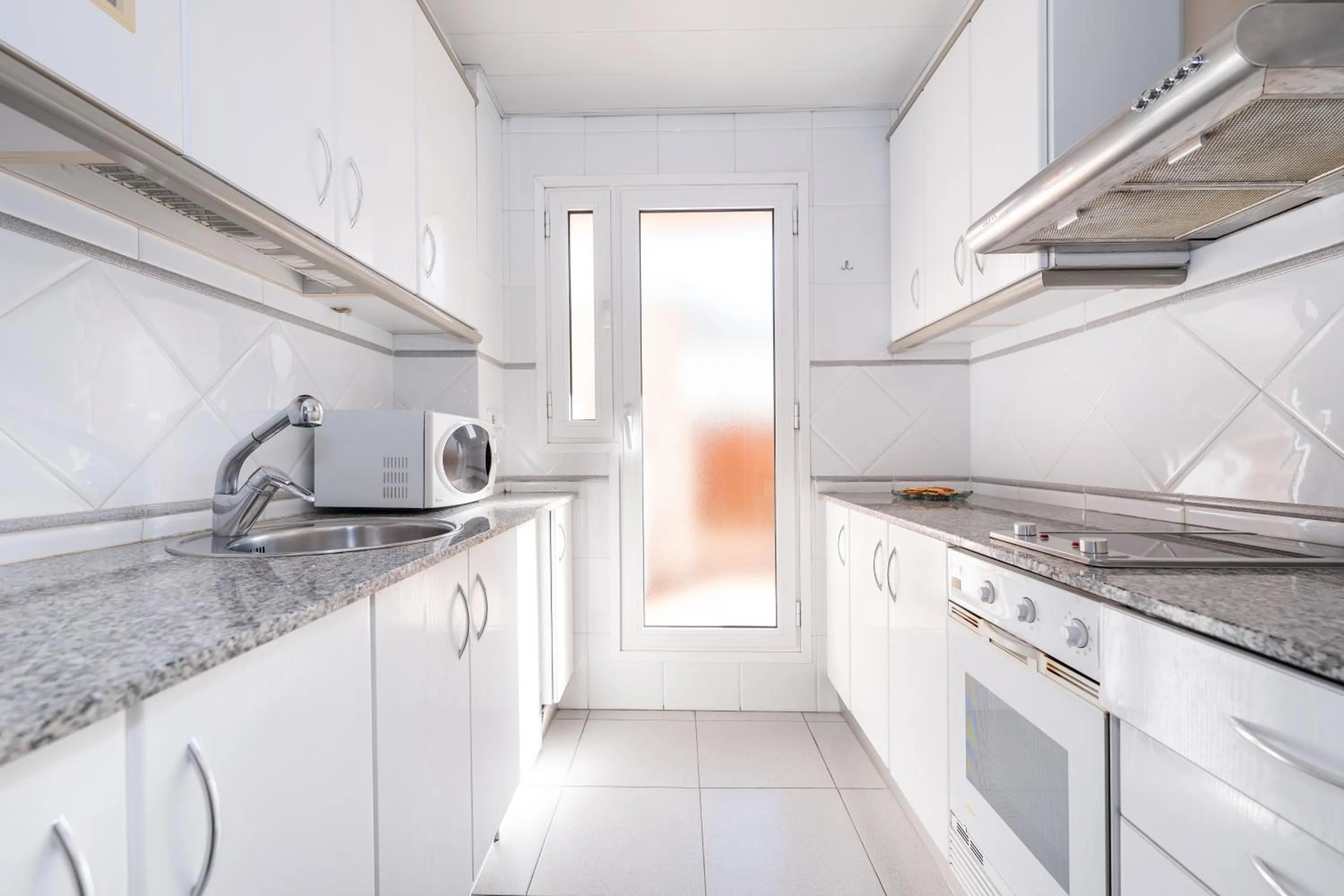 Kitchen or kitchenette in Aparthotel Napols - Abapart