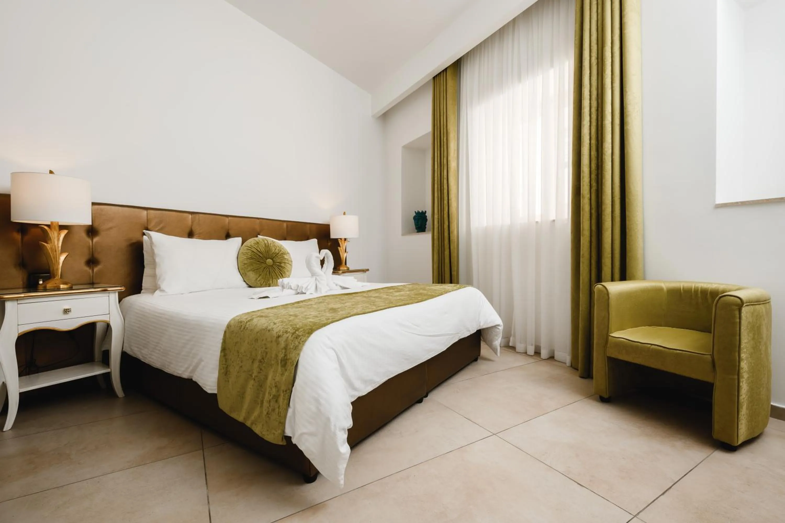 Bed in Giorgio Boutique Hotel