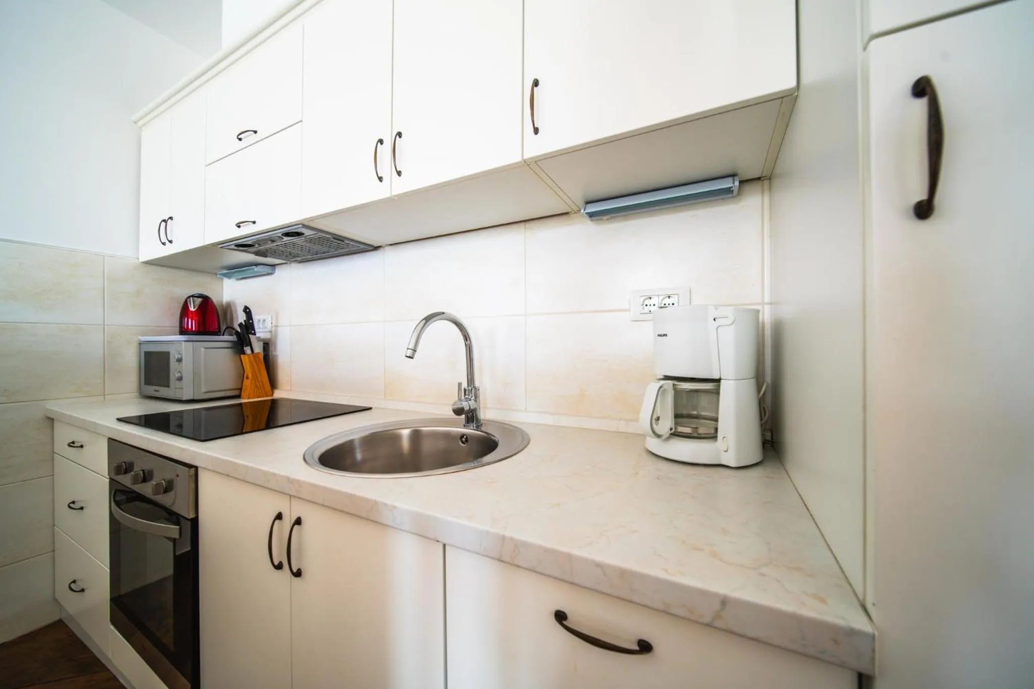 Kitchen or kitchenette in Apartments Vila Riva