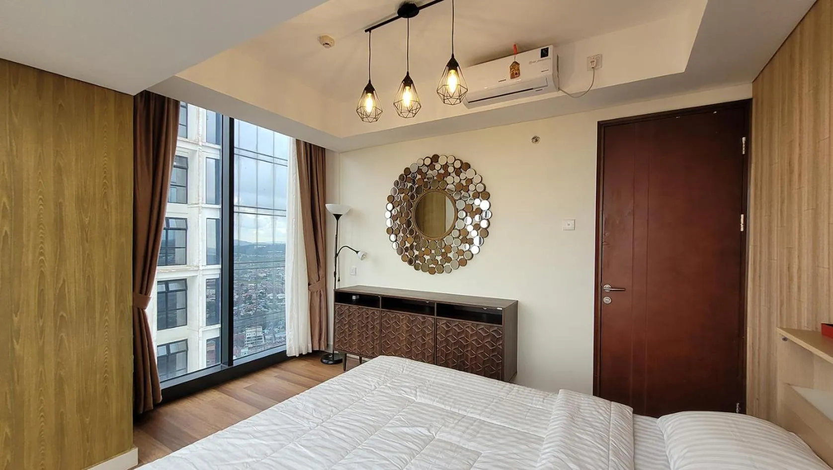 Bed in Palam Mansion at Meisterstadt Pollux Habibie Apartment