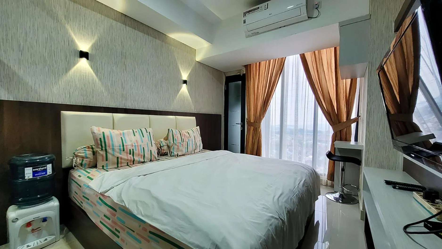 Bed in Palam Mansion at Meisterstadt Pollux Habibie Apartment