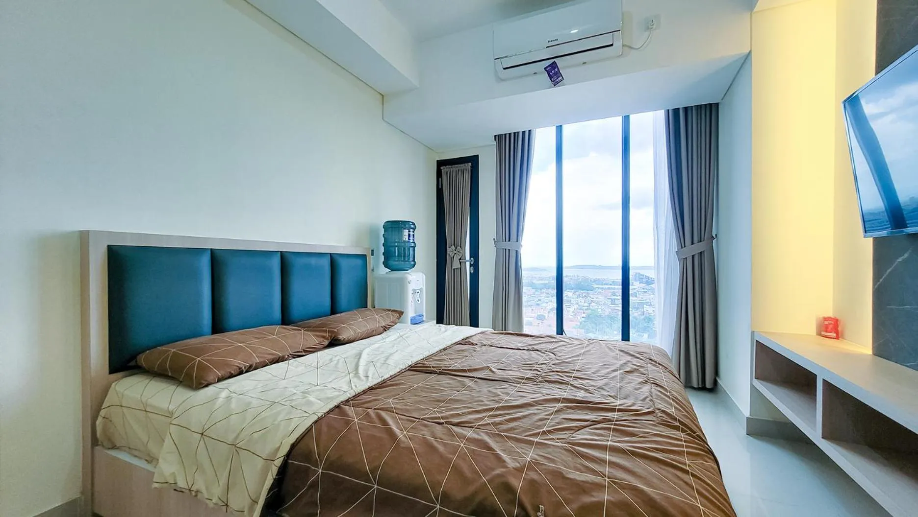 Bed in Palam Mansion at Meisterstadt Pollux Habibie Apartment