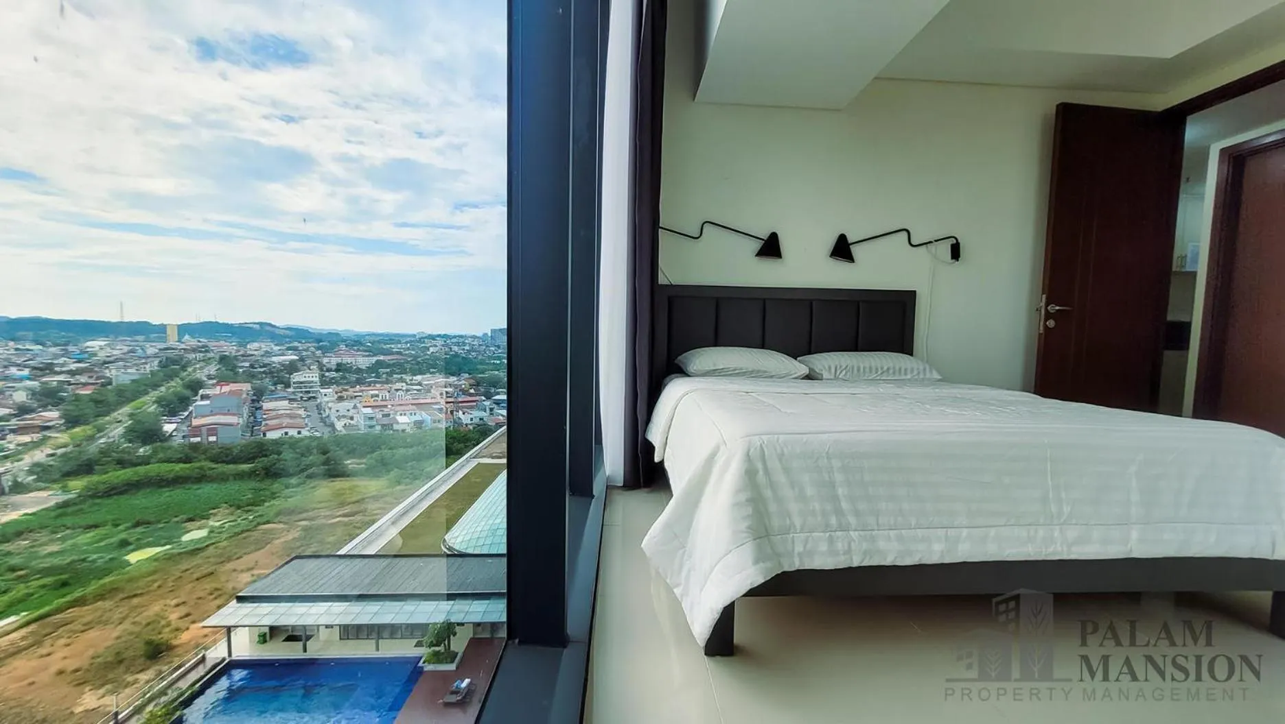 Bed in Palam Mansion at Meisterstadt Pollux Habibie Apartment