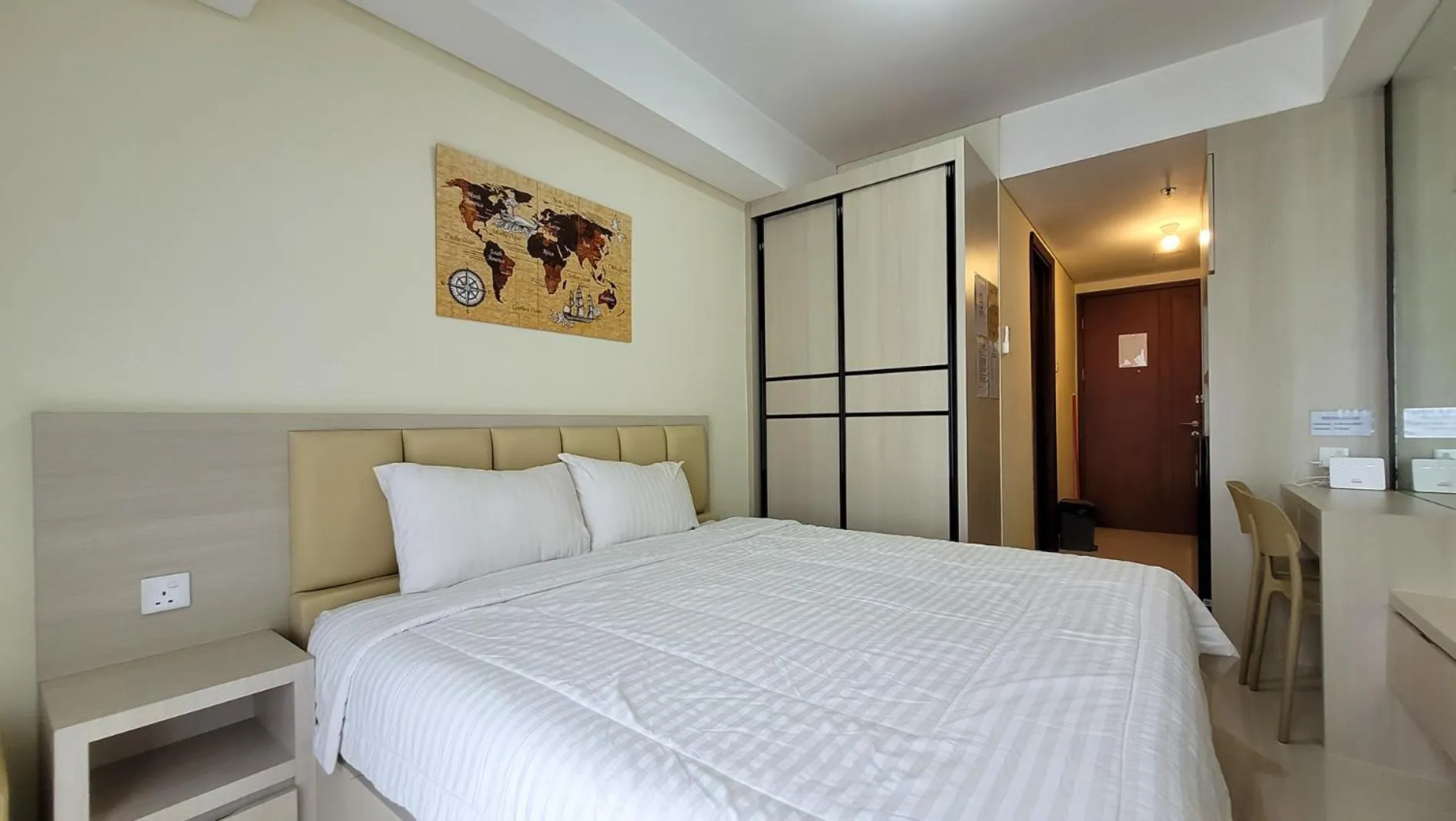 Bed in Palam Mansion at Meisterstadt Pollux Habibie Apartment