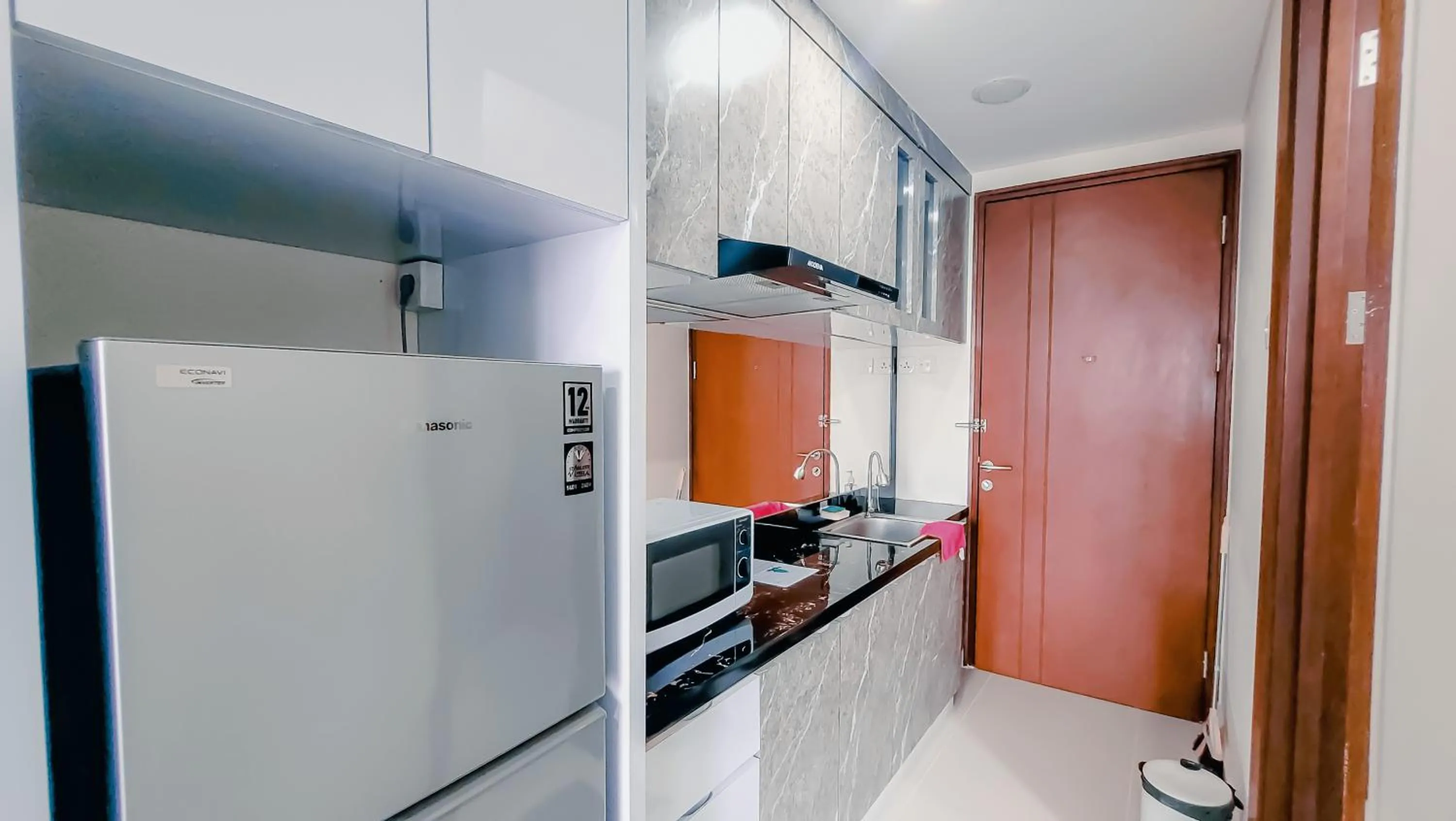 minibar in Palam Mansion at Meisterstadt Pollux Habibie Apartment