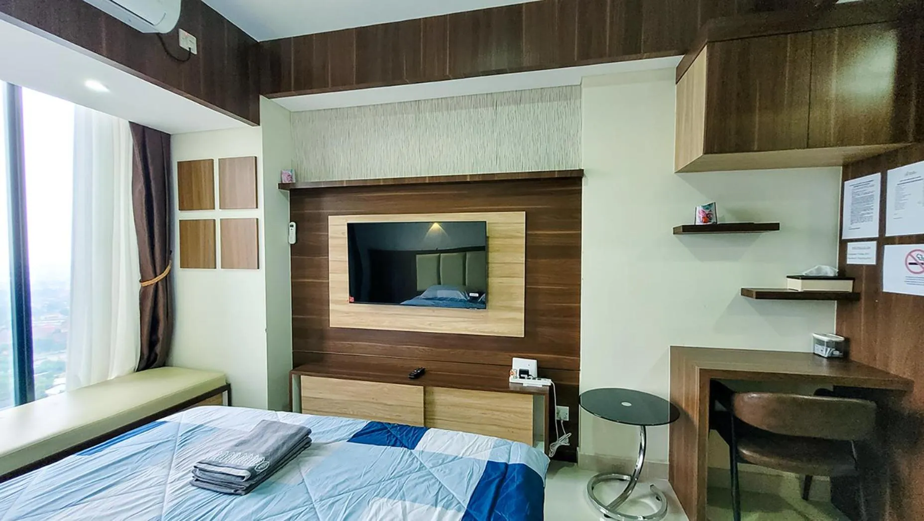 Bed in Palam Mansion at Meisterstadt Pollux Habibie Apartment