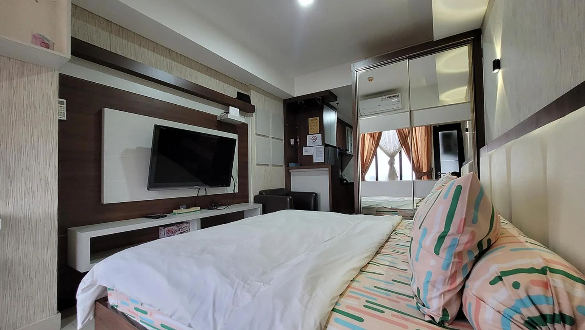 TV and multimedia, Bed in Palam Mansion at Meisterstadt Pollux Habibie Apartment
