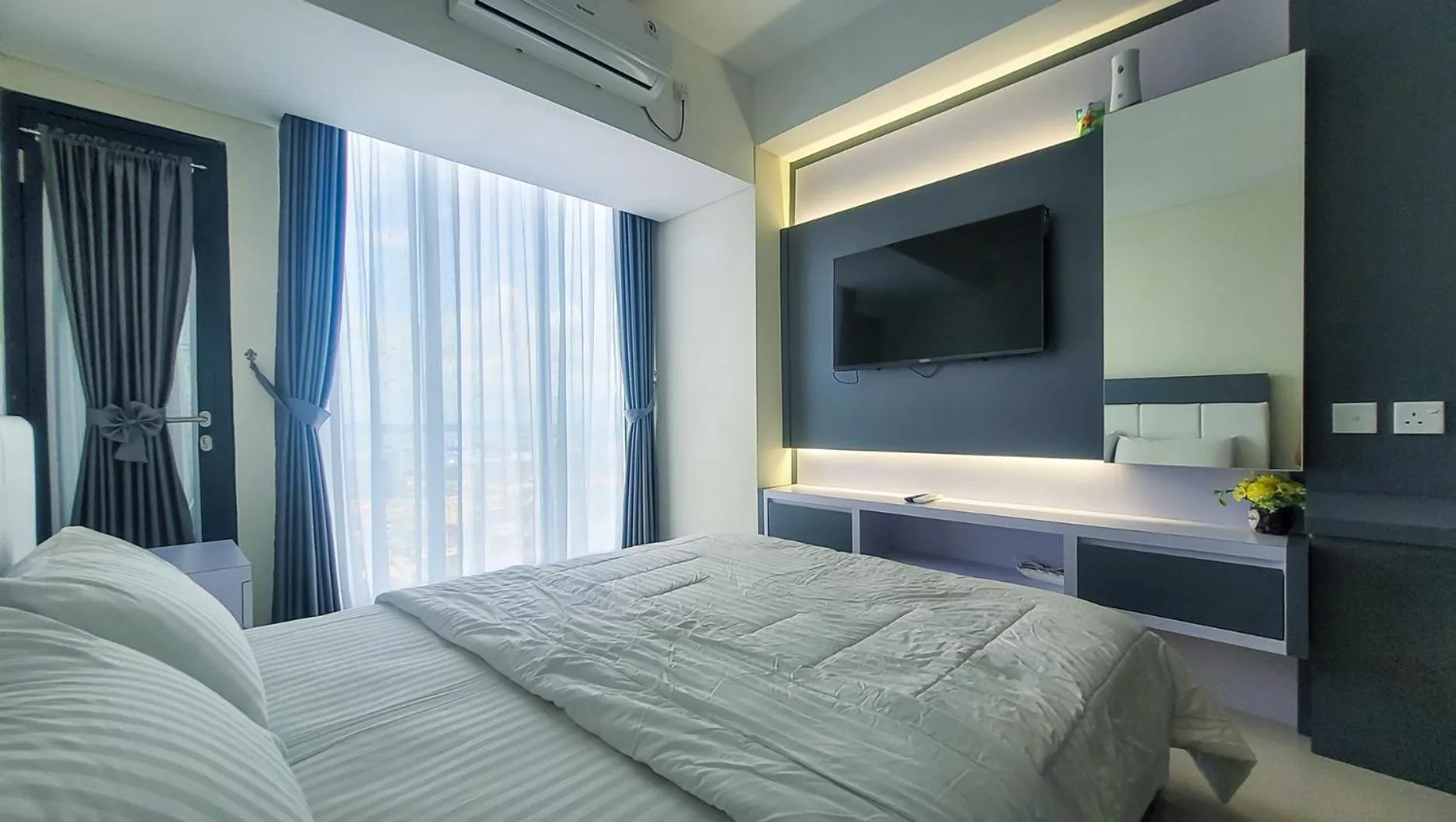 Bed in Palam Mansion at Meisterstadt Pollux Habibie Apartment