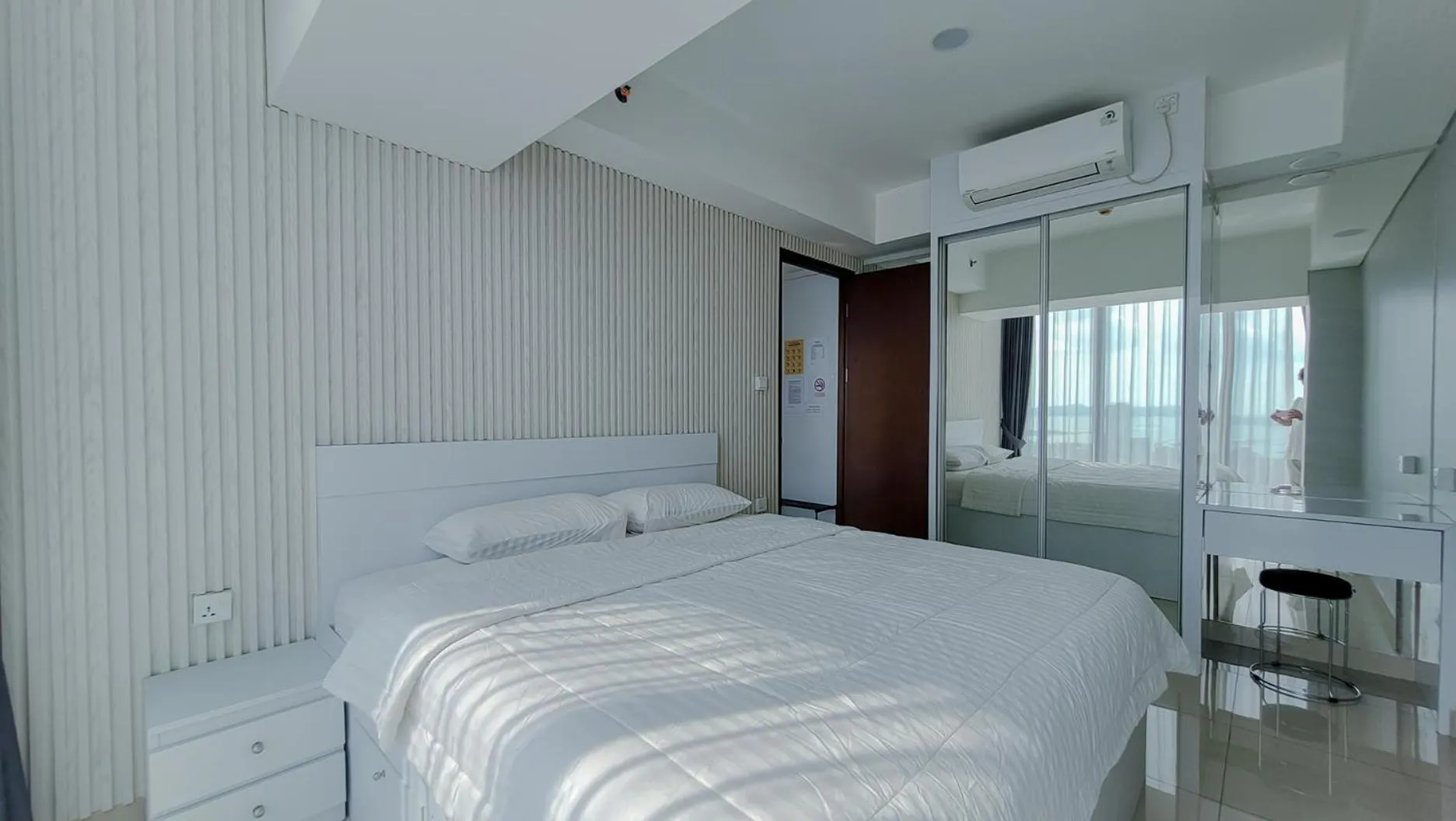 Bed in Palam Mansion at Meisterstadt Pollux Habibie Apartment