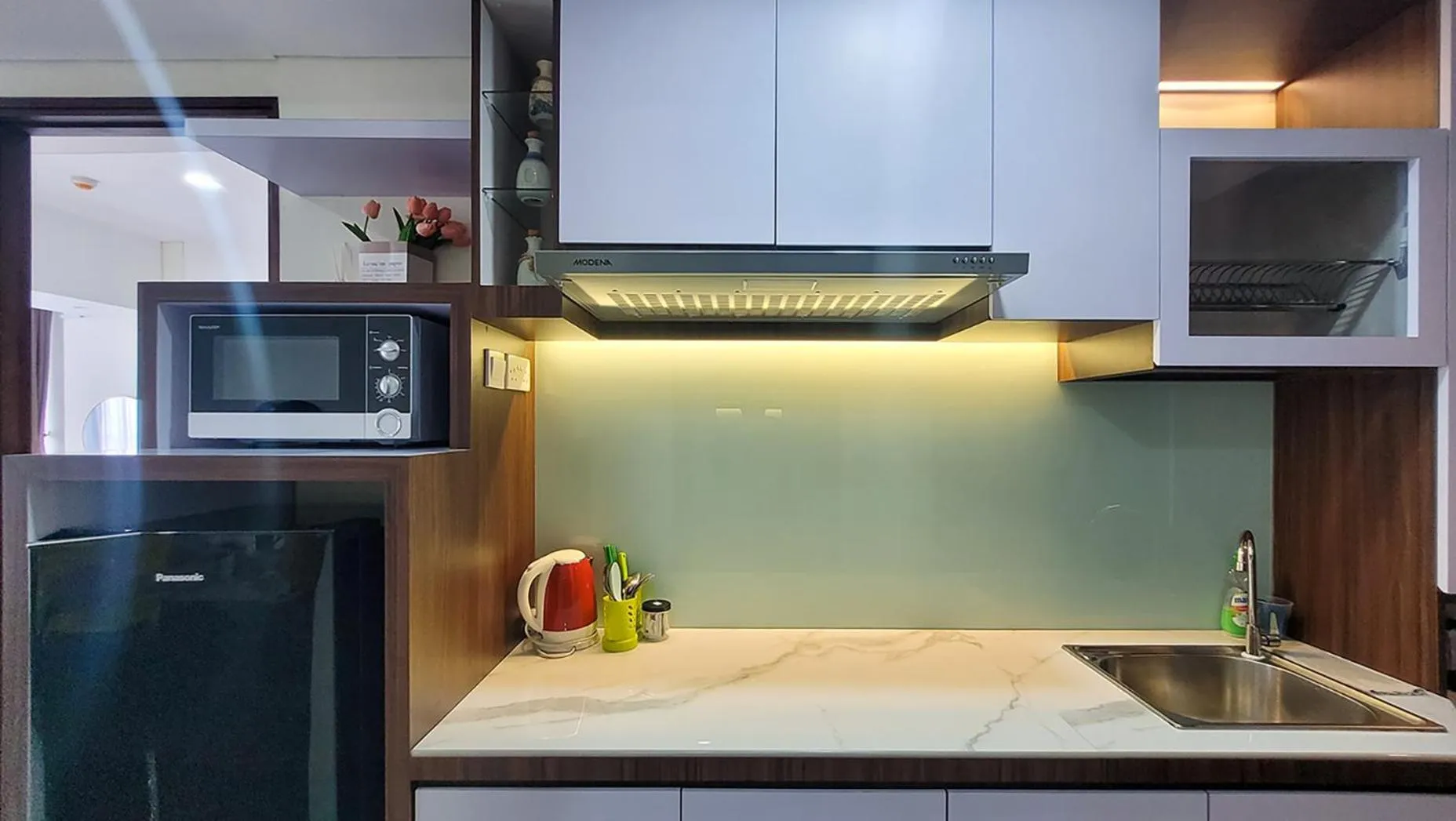 Kitchen or kitchenette in Palam Mansion at Meisterstadt Pollux Habibie Apartment