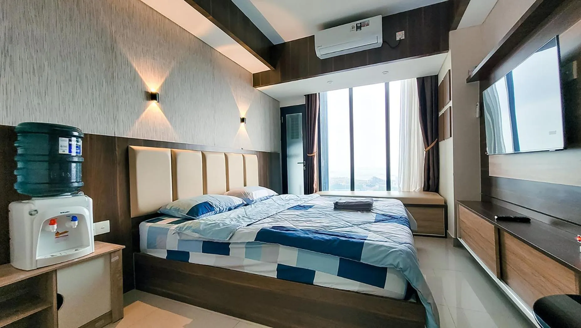 Bed in Palam Mansion at Meisterstadt Pollux Habibie Apartment