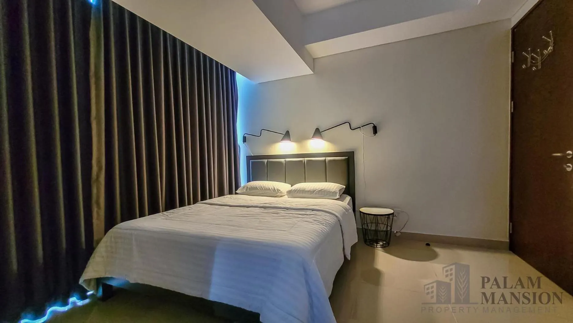 Bed in Palam Mansion at Meisterstadt Pollux Habibie Apartment