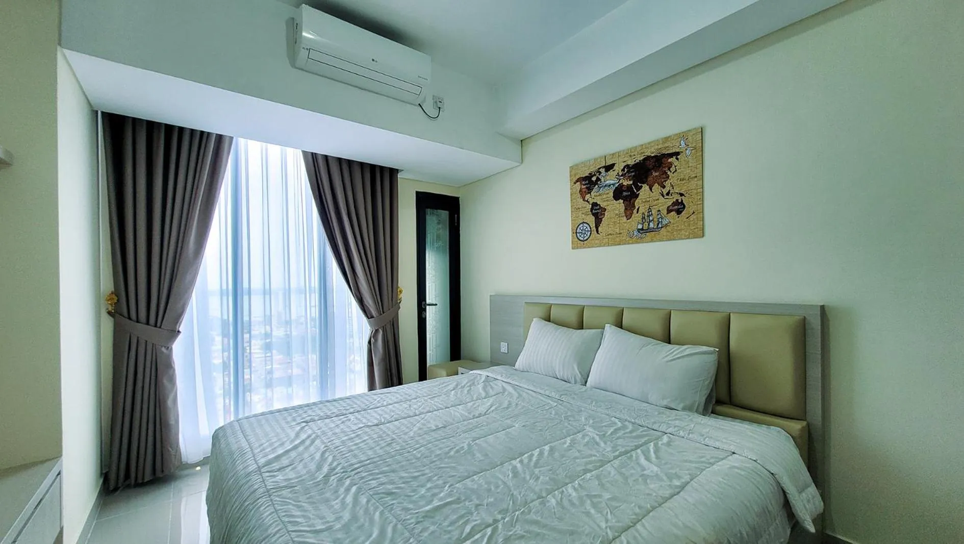 Bed in Palam Mansion at Meisterstadt Pollux Habibie Apartment