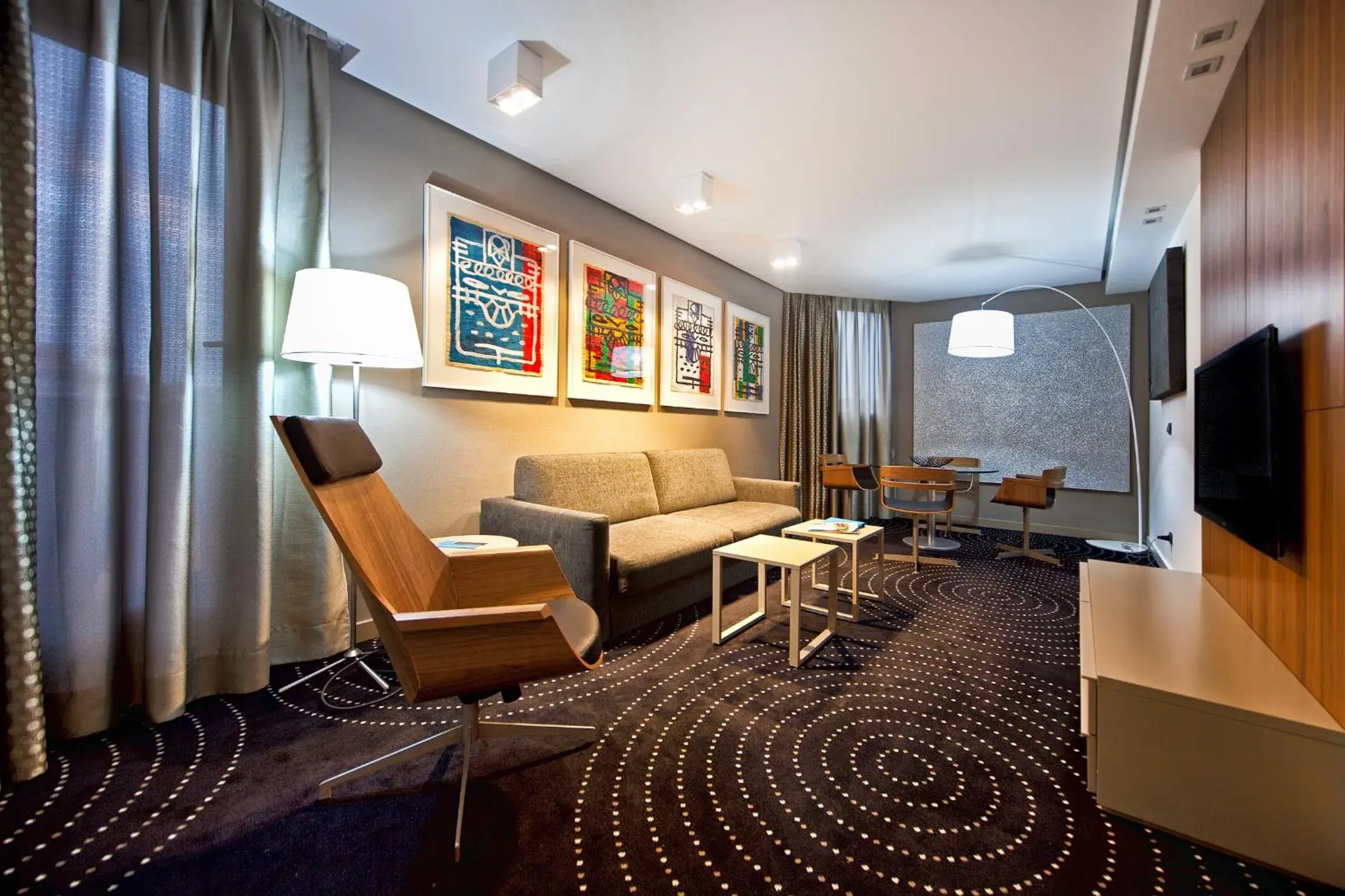 Living room in Hotel Silken Amara Plaza Living room in Hotel Silken Amara Plaza