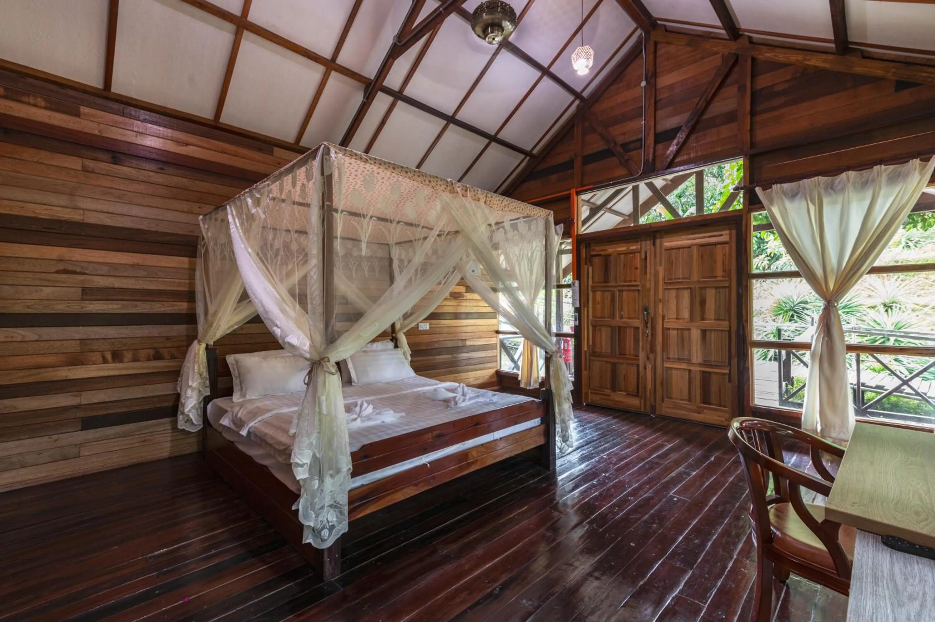 Bed in Borneo Sepilok Rainforest Resort