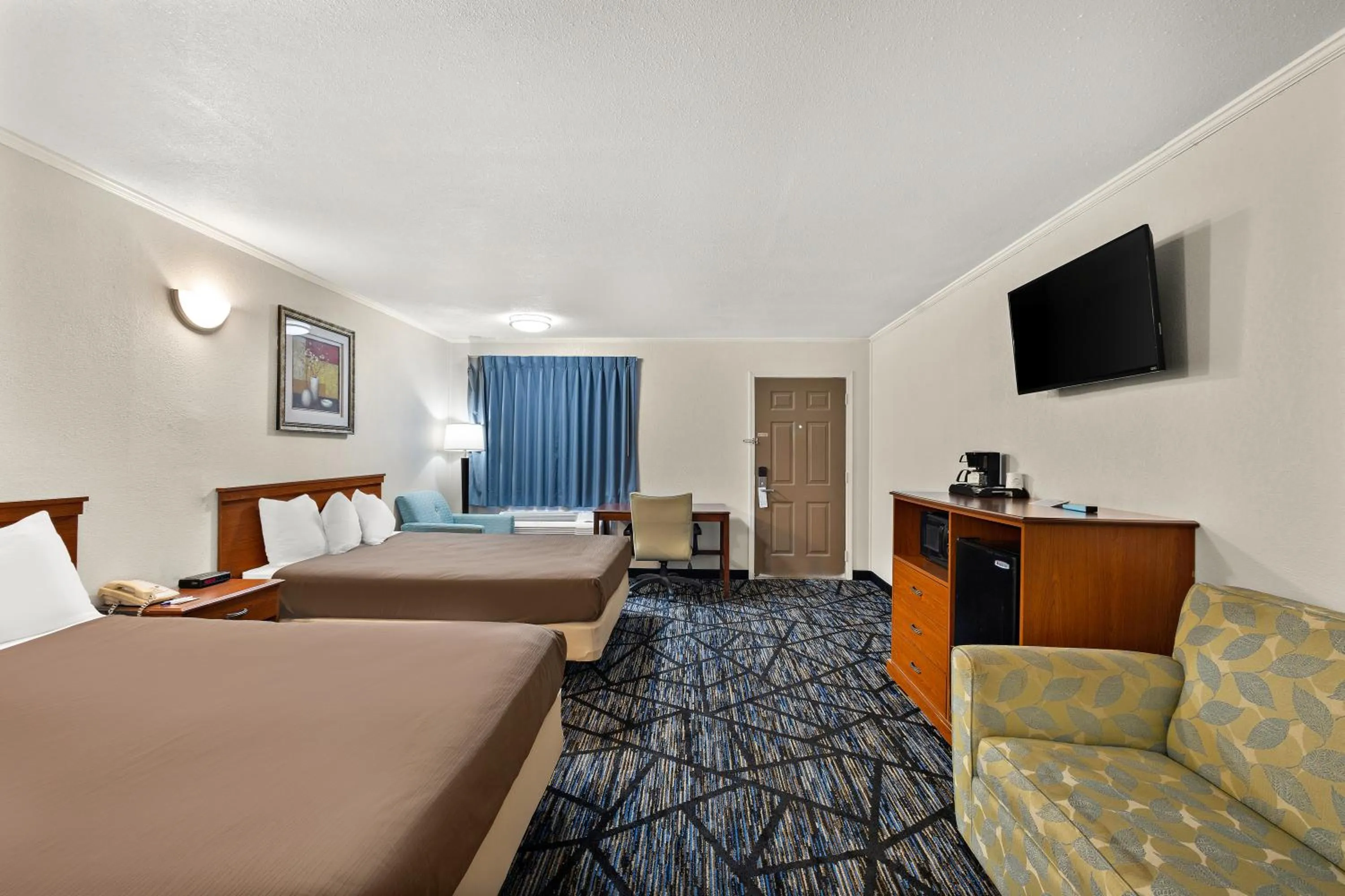 Bed in Americas Best Value Inn-Celina