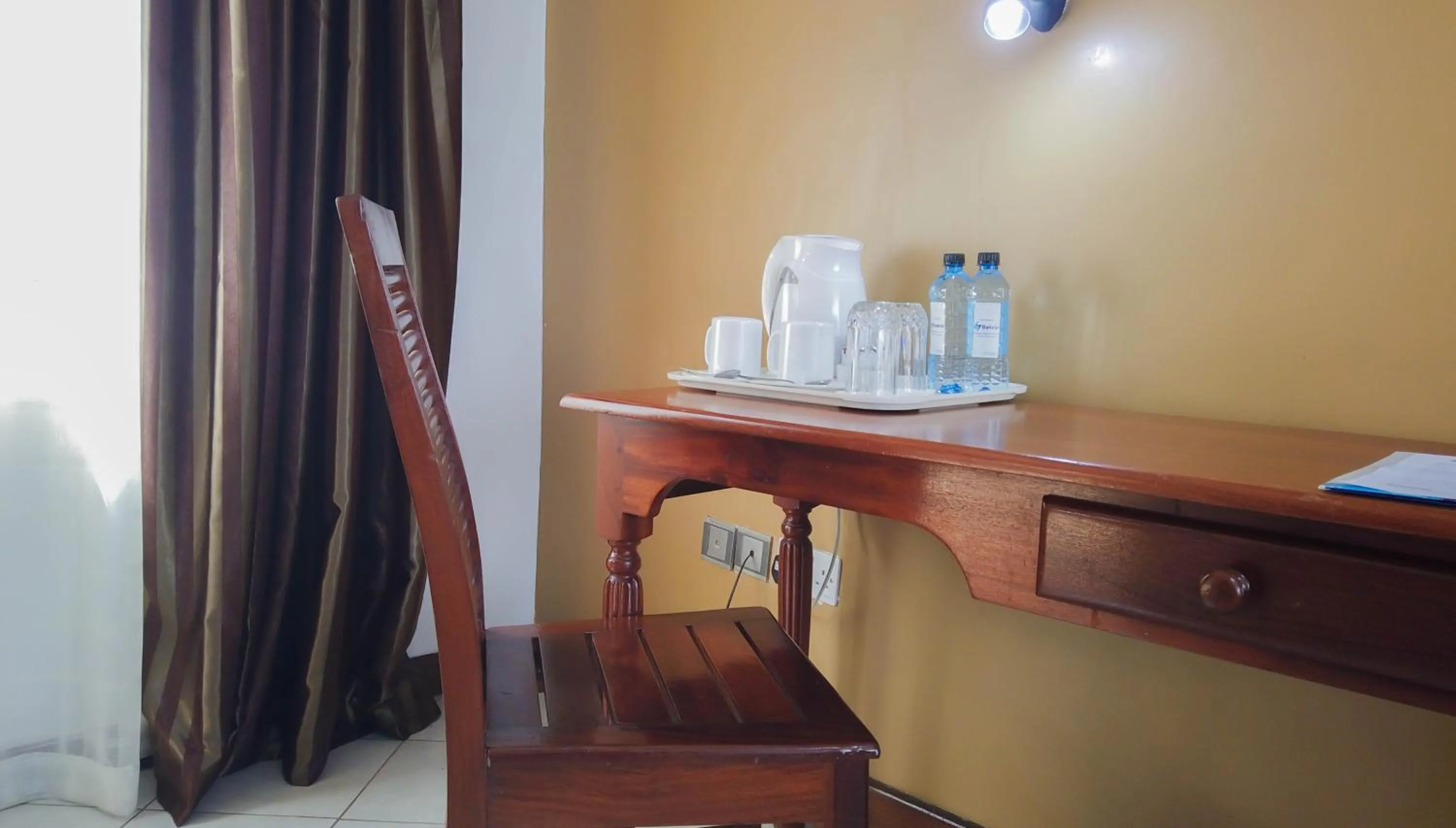 hair dresser in 67 Airport Hotel Nairobi