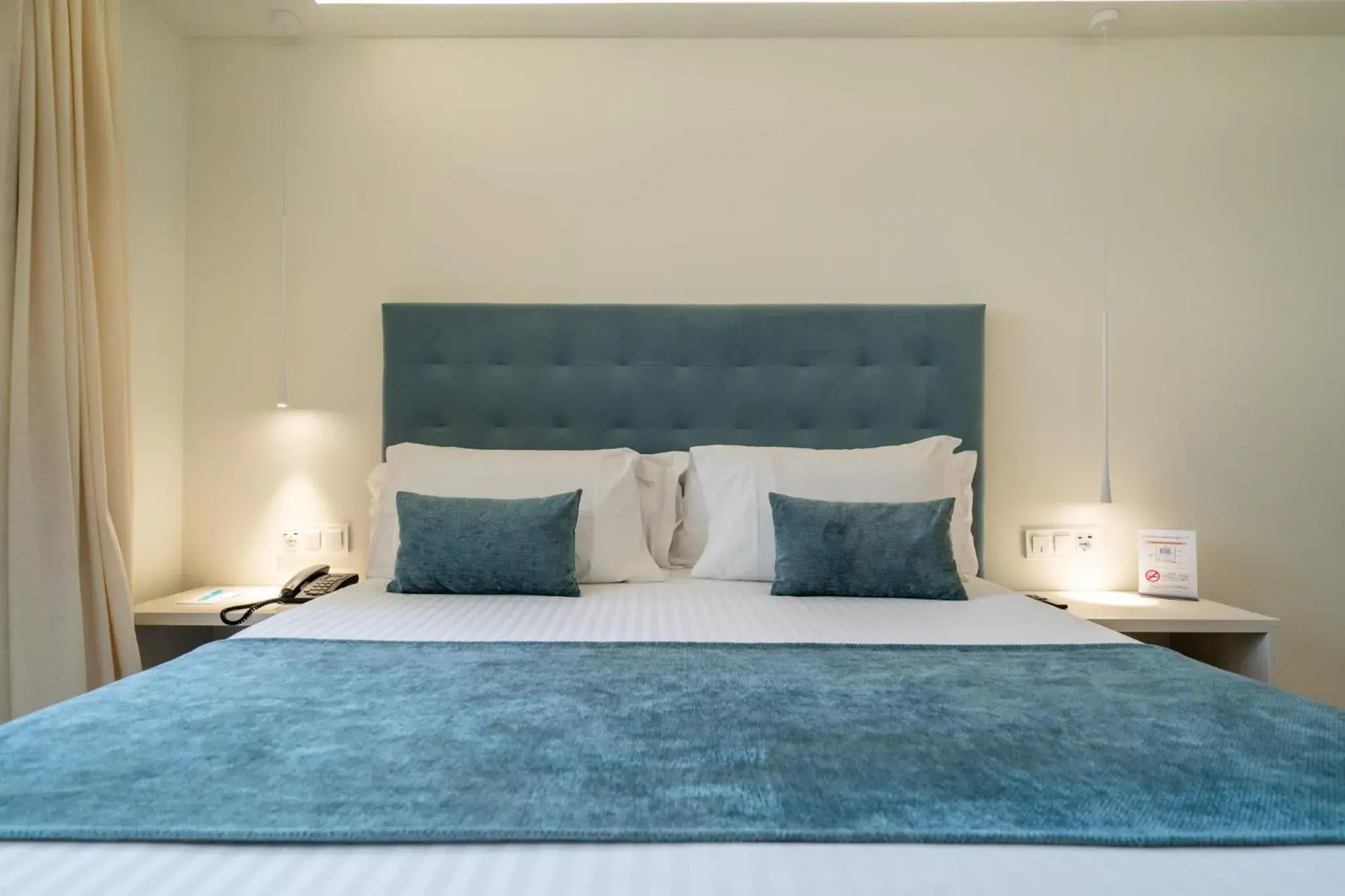 Bed in Hotel Concordia Barcelona Bed in Hotel Concordia Barcelona