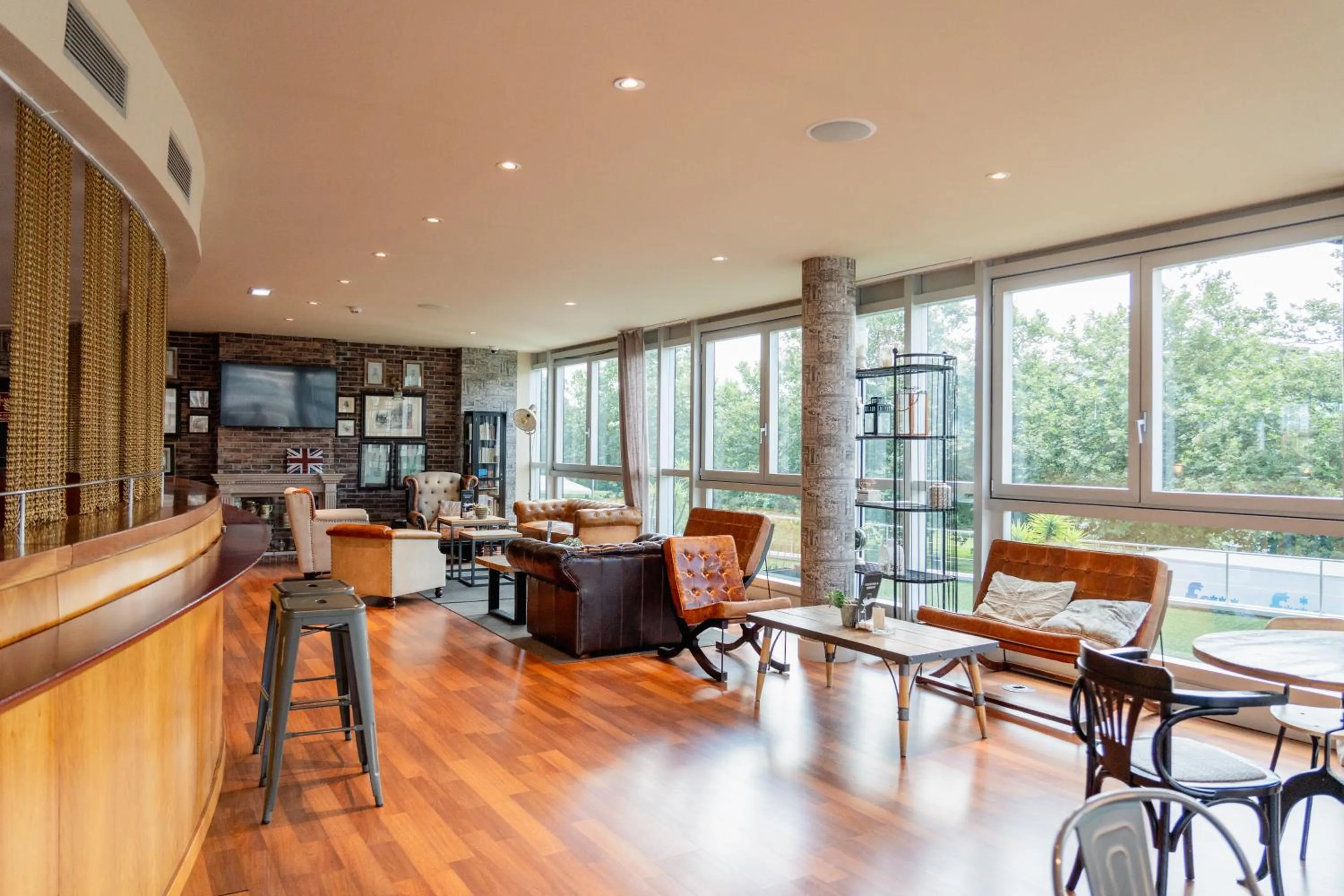 Lounge or bar in Abba Playa Gijón