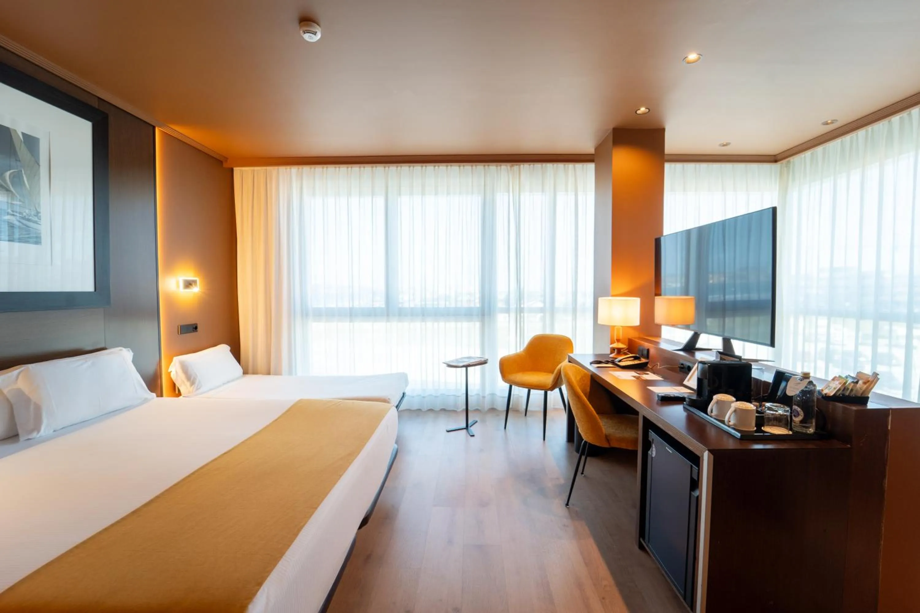 Photo of the whole room, Bed in Abba Playa Gijón