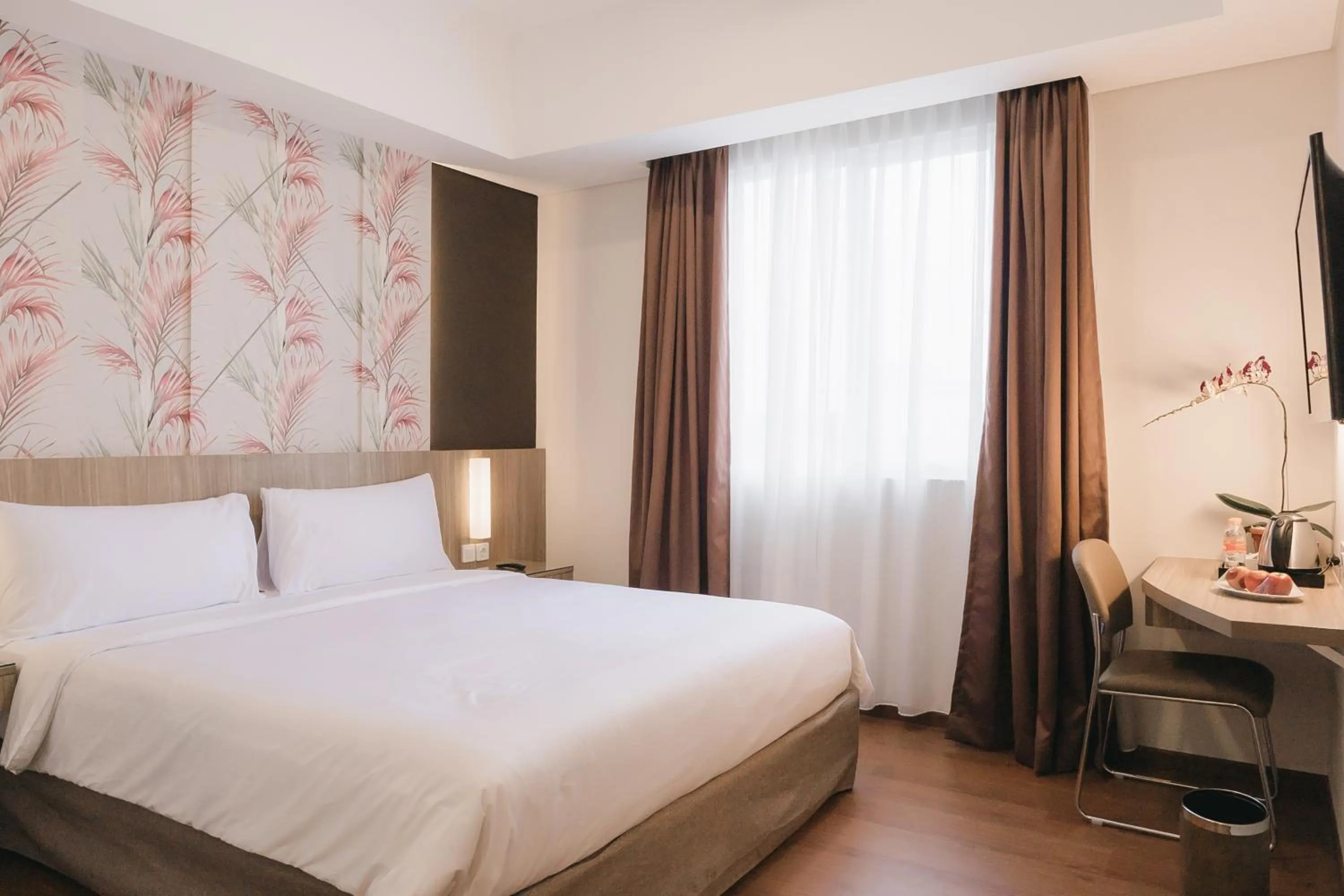 Bed in Grand G7 Hotel Pasar baru