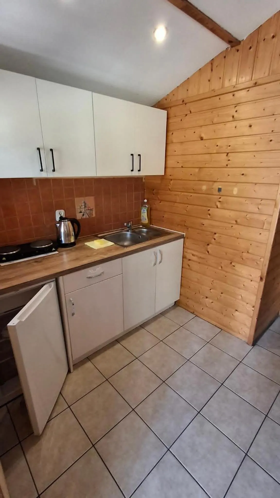 Kitchen or kitchenette in Ośrodek Wypoczynkowy Jelonek