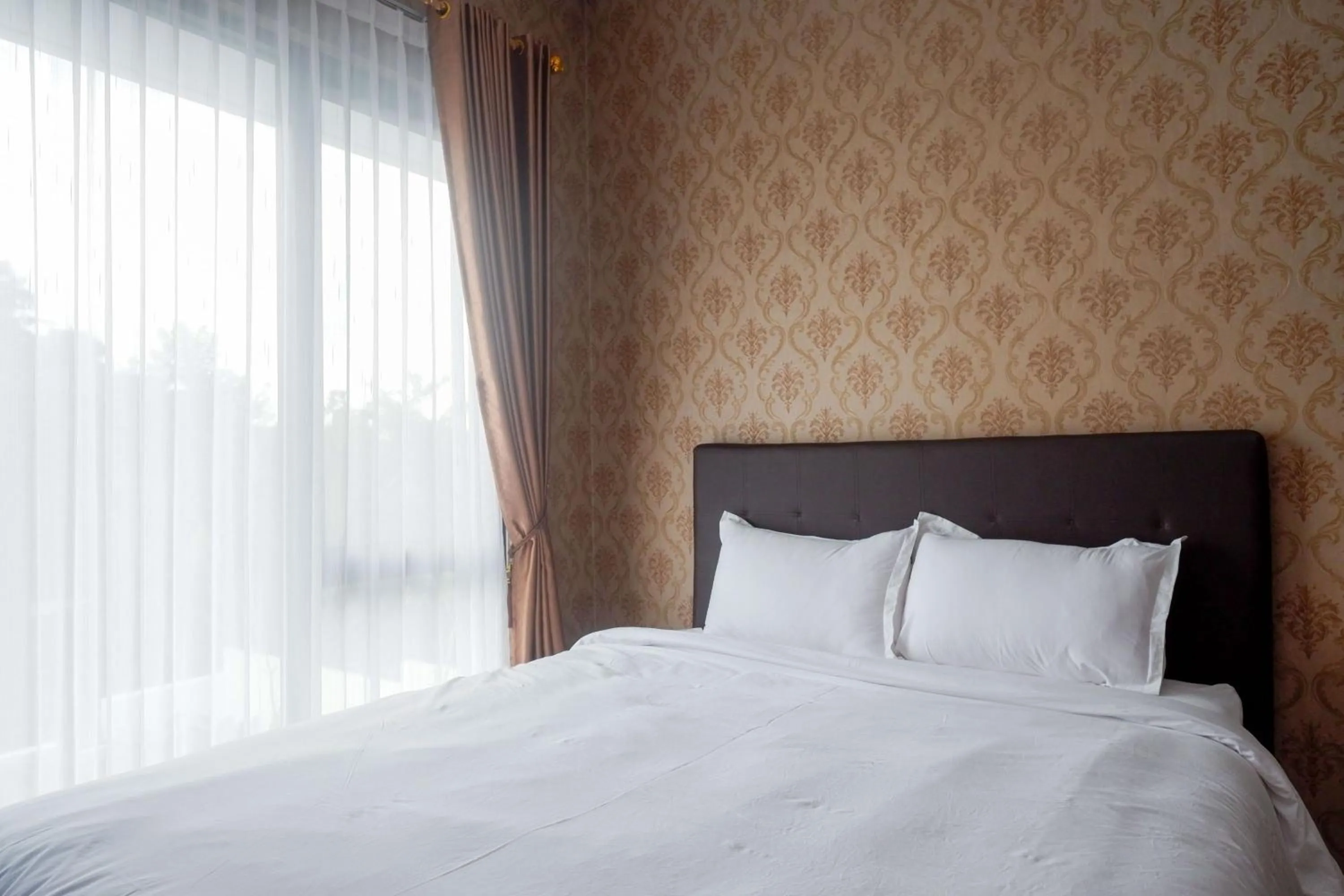 Bedroom, Bed in The Lavana Greenkhaza Villa Jogja