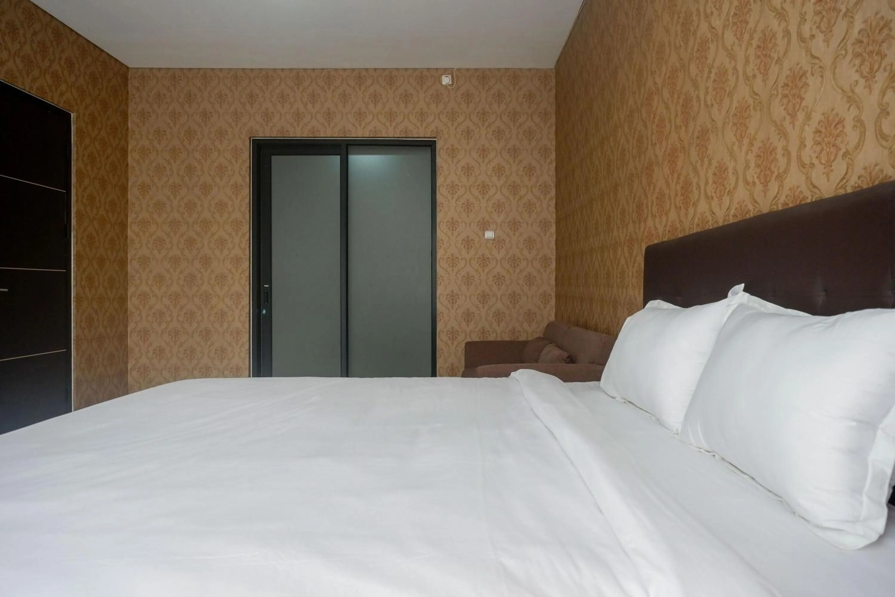 Bedroom, Bed in The Lavana Greenkhaza Villa Jogja