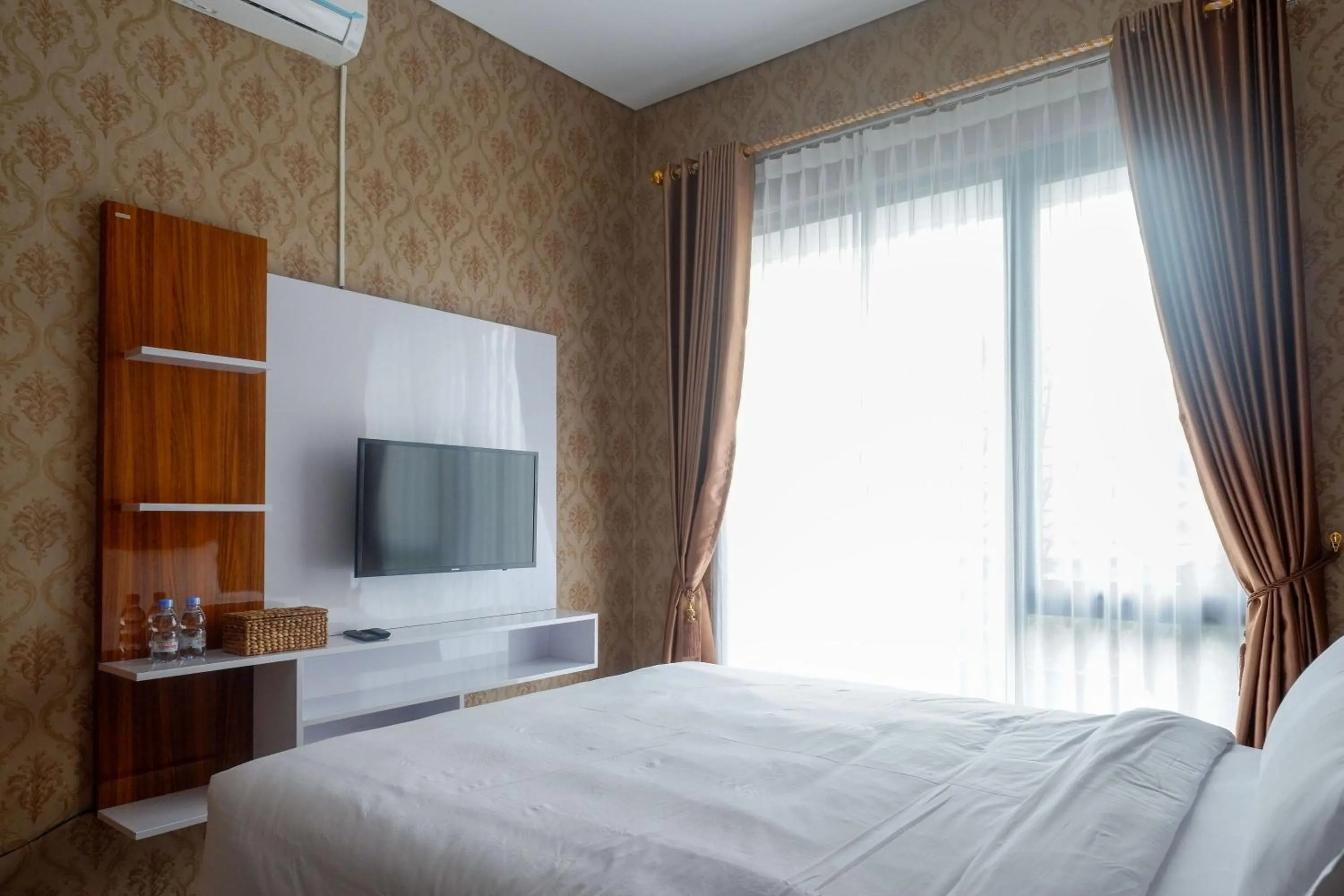 Bedroom, Bed in The Lavana Greenkhaza Villa Jogja