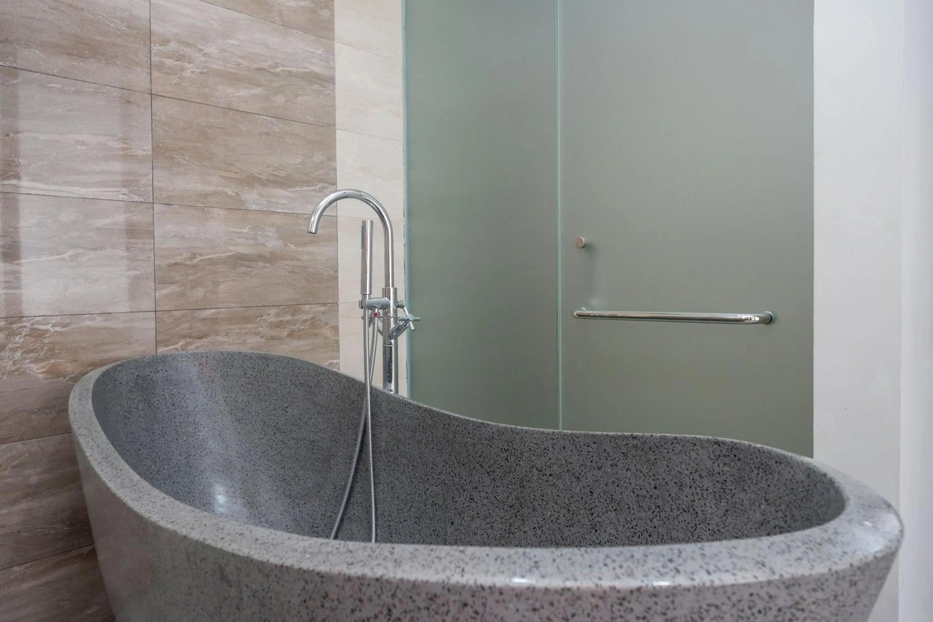 Bathroom in The Lavana Greenkhaza Villa Jogja