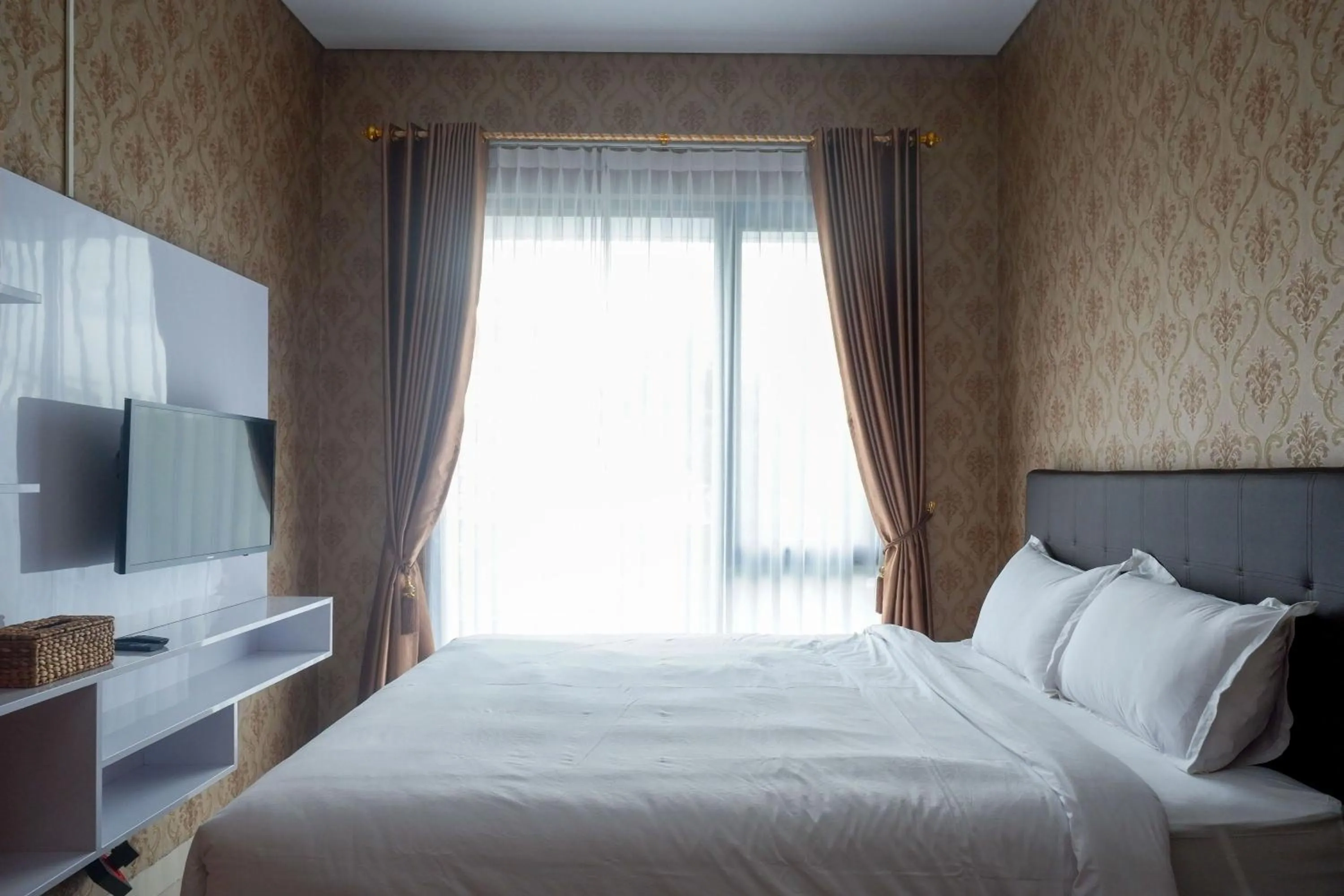 Bedroom, Bed in The Lavana Greenkhaza Villa Jogja