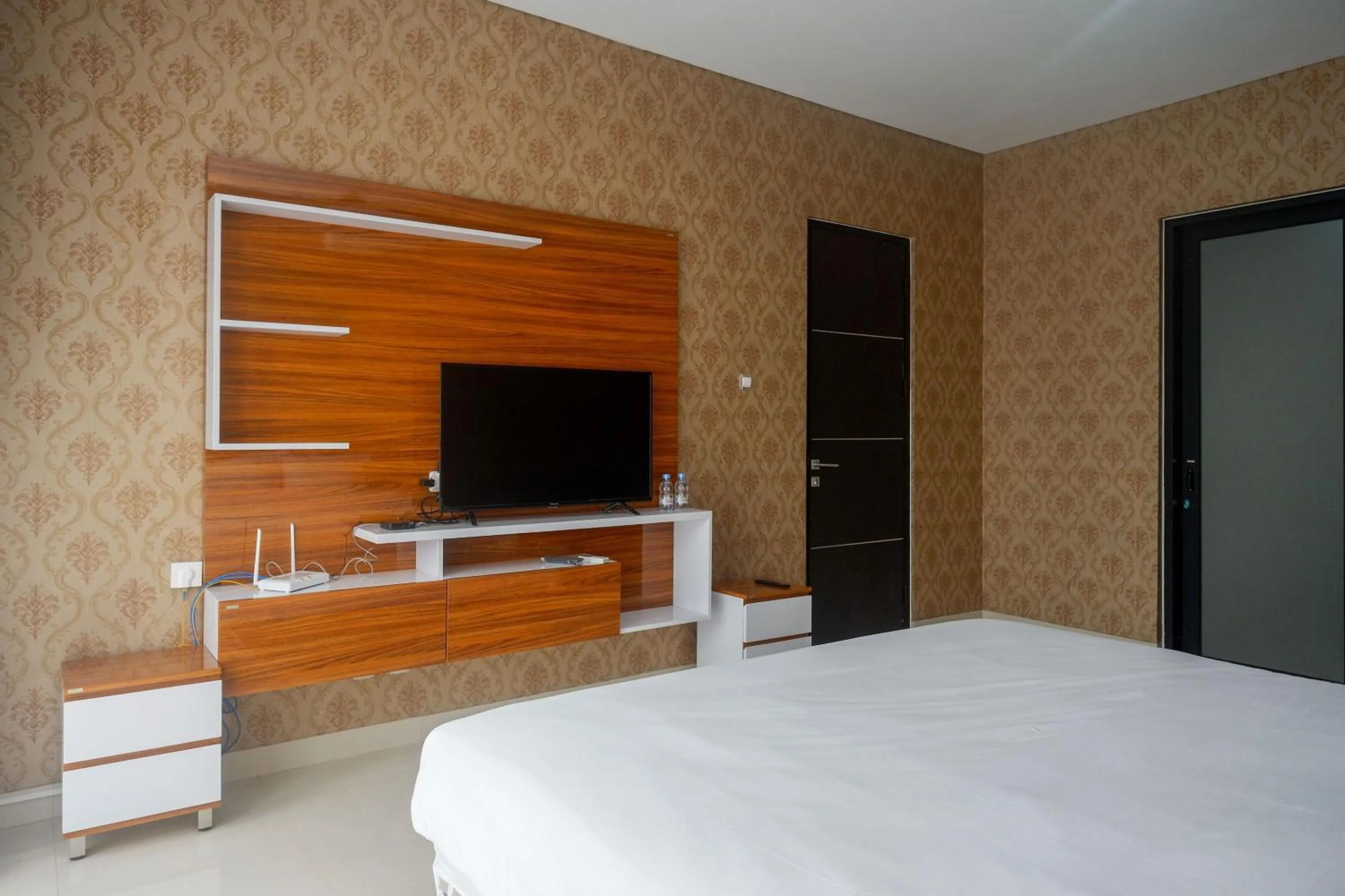 Bedroom, Bed in The Lavana Greenkhaza Villa Jogja