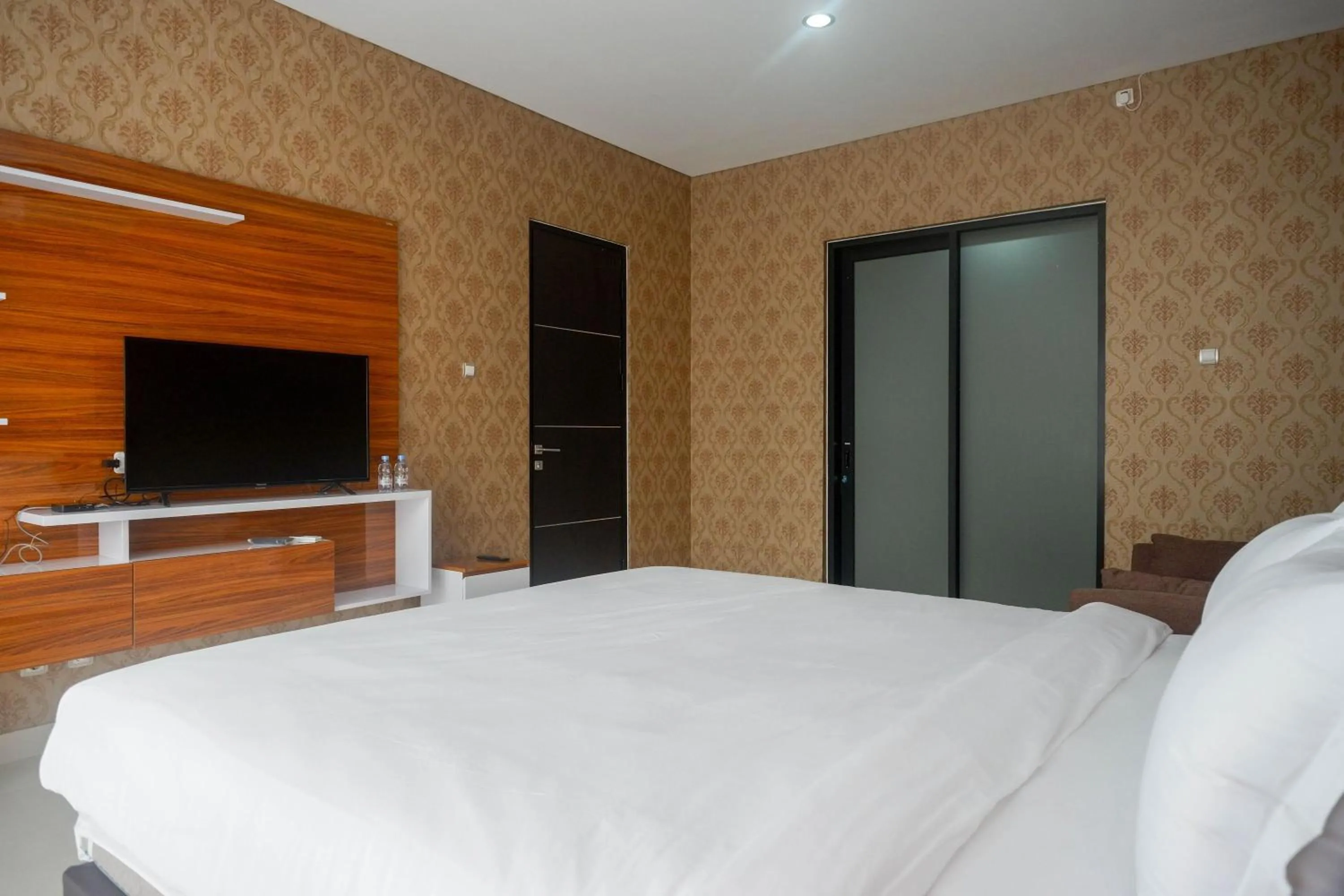 Bedroom, Bed in The Lavana Greenkhaza Villa Jogja