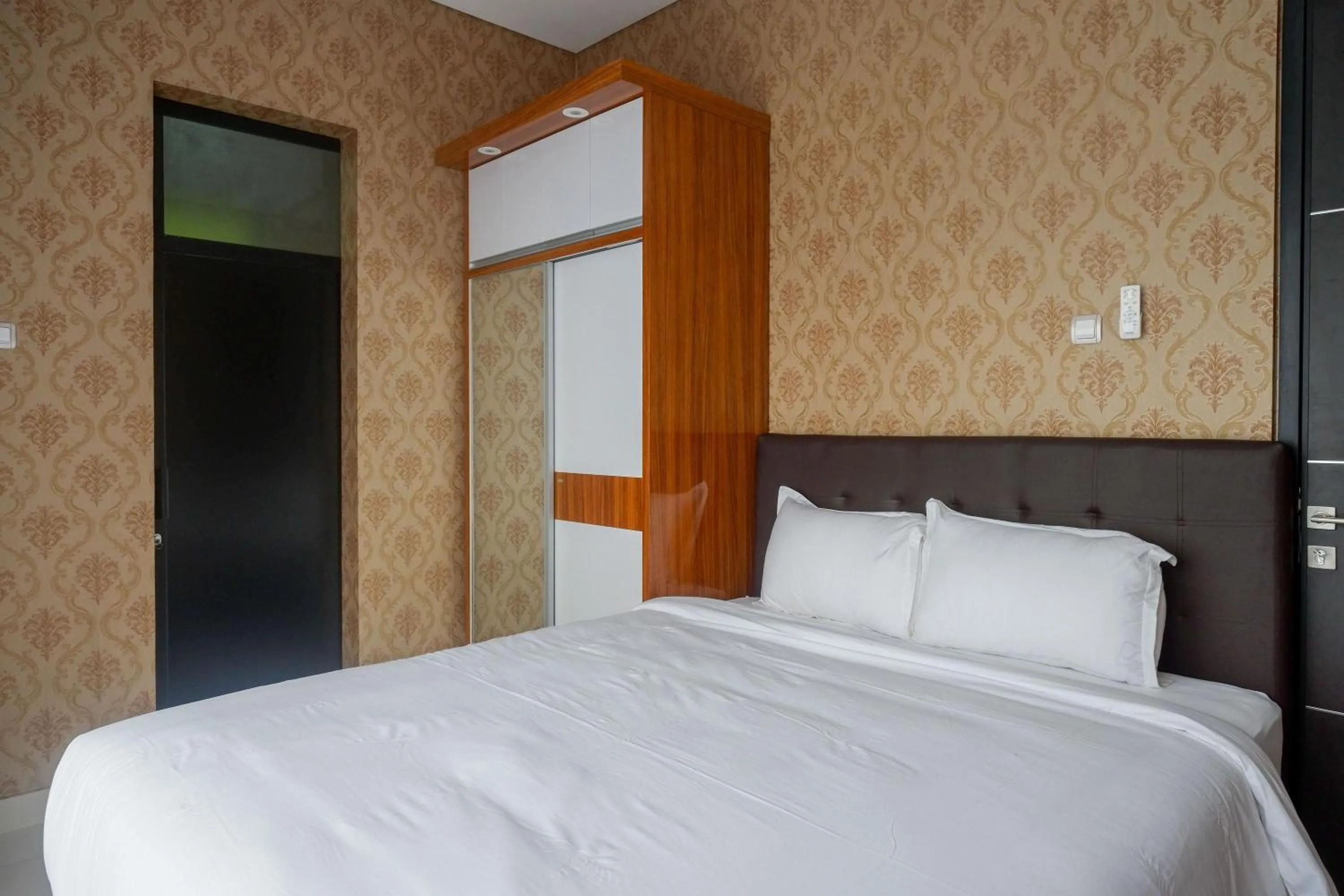 Bedroom, Bed in The Lavana Greenkhaza Villa Jogja