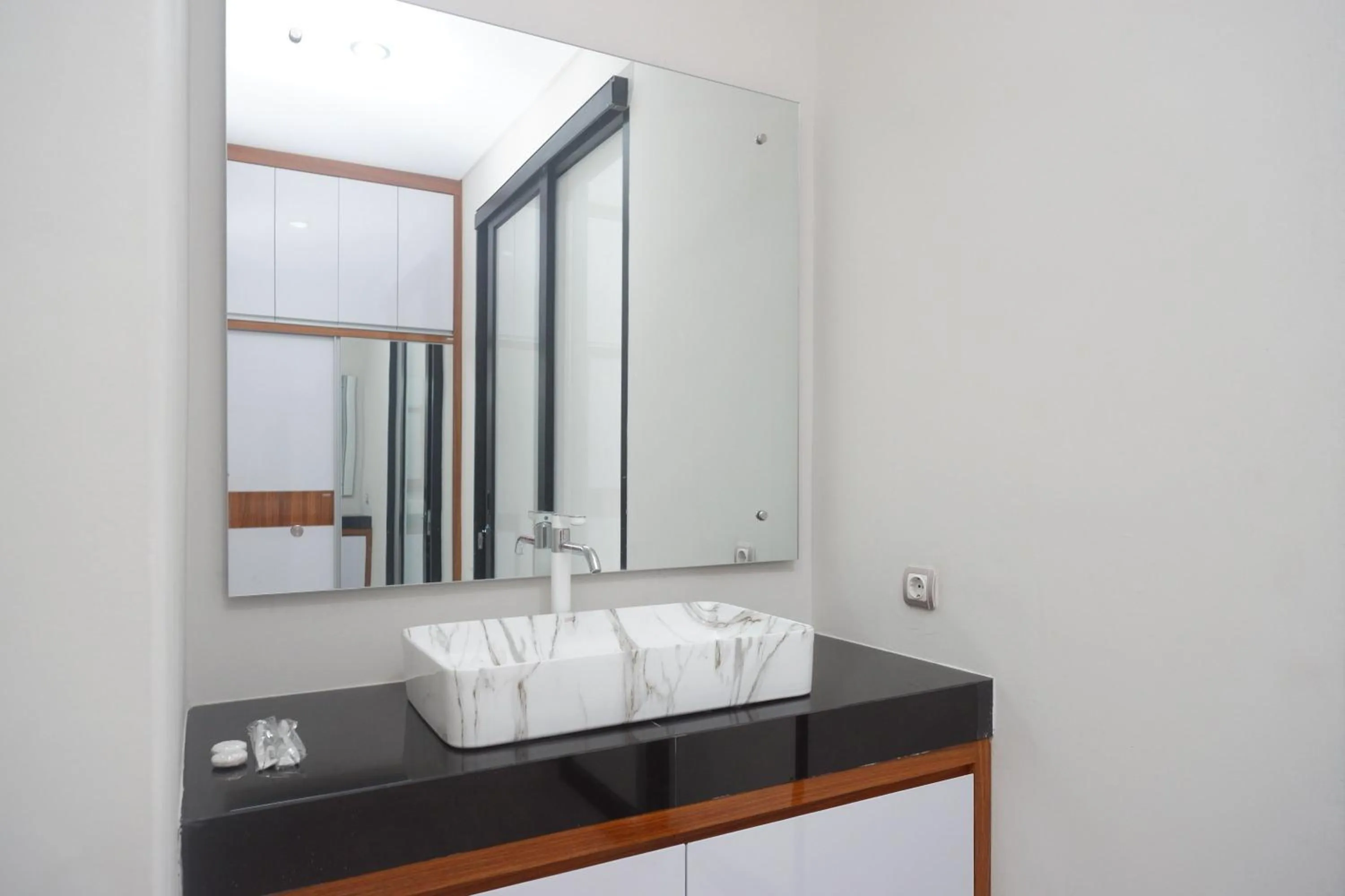 Bathroom in The Lavana Greenkhaza Villa Jogja