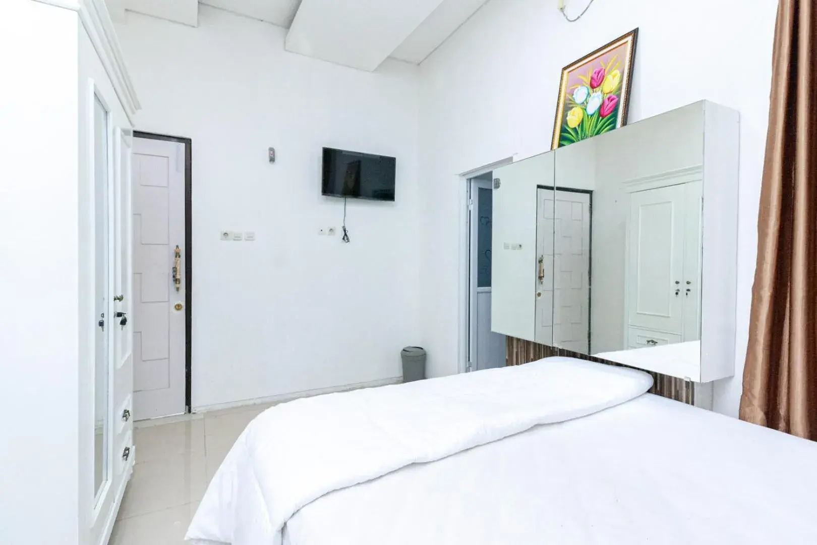 Bedroom, Bed in Urbanview Daniela Jambi by RedDoorz Bedroom, Bed in Urbanview Daniela Jambi by RedDoorz