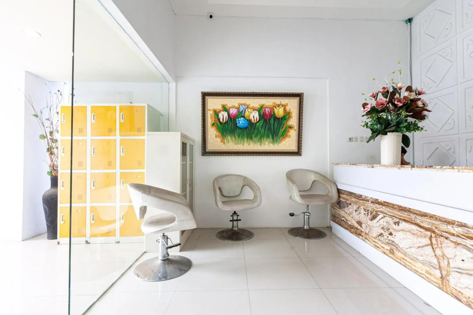 Lobby or reception in Urbanview Daniela Jambi by RedDoorz