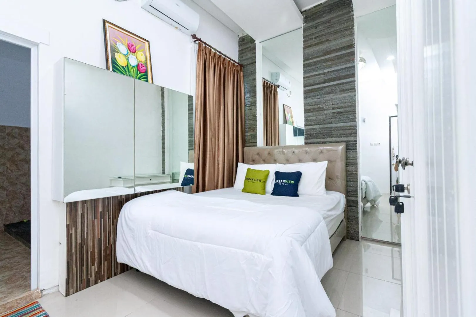 Bedroom, Bed in Urbanview Daniela Jambi by RedDoorz