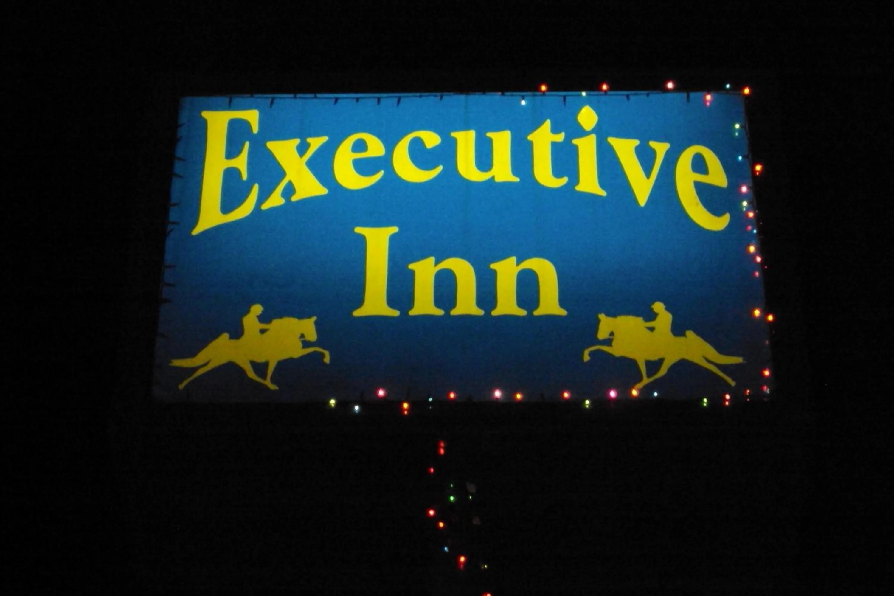 Property logo or sign in Executive Inn