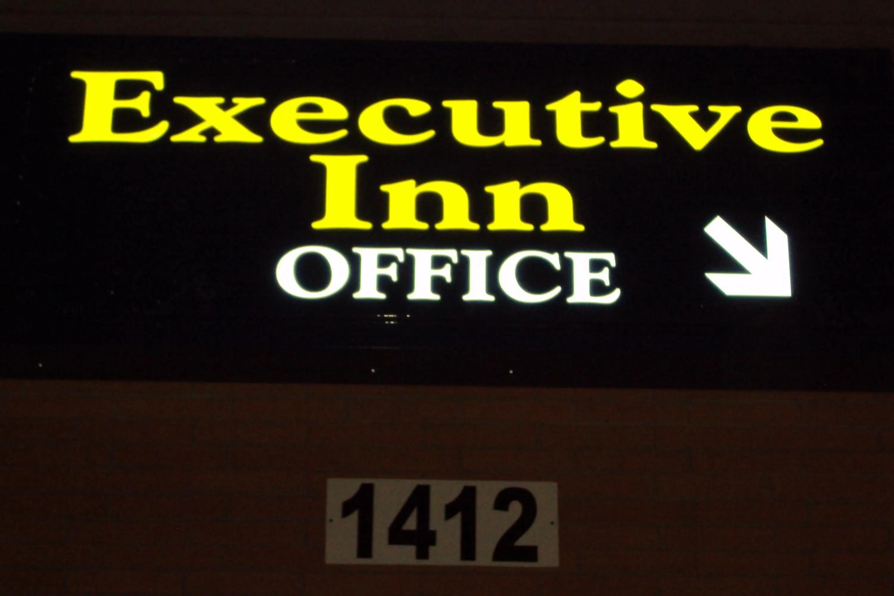 Property logo or sign in Executive Inn
