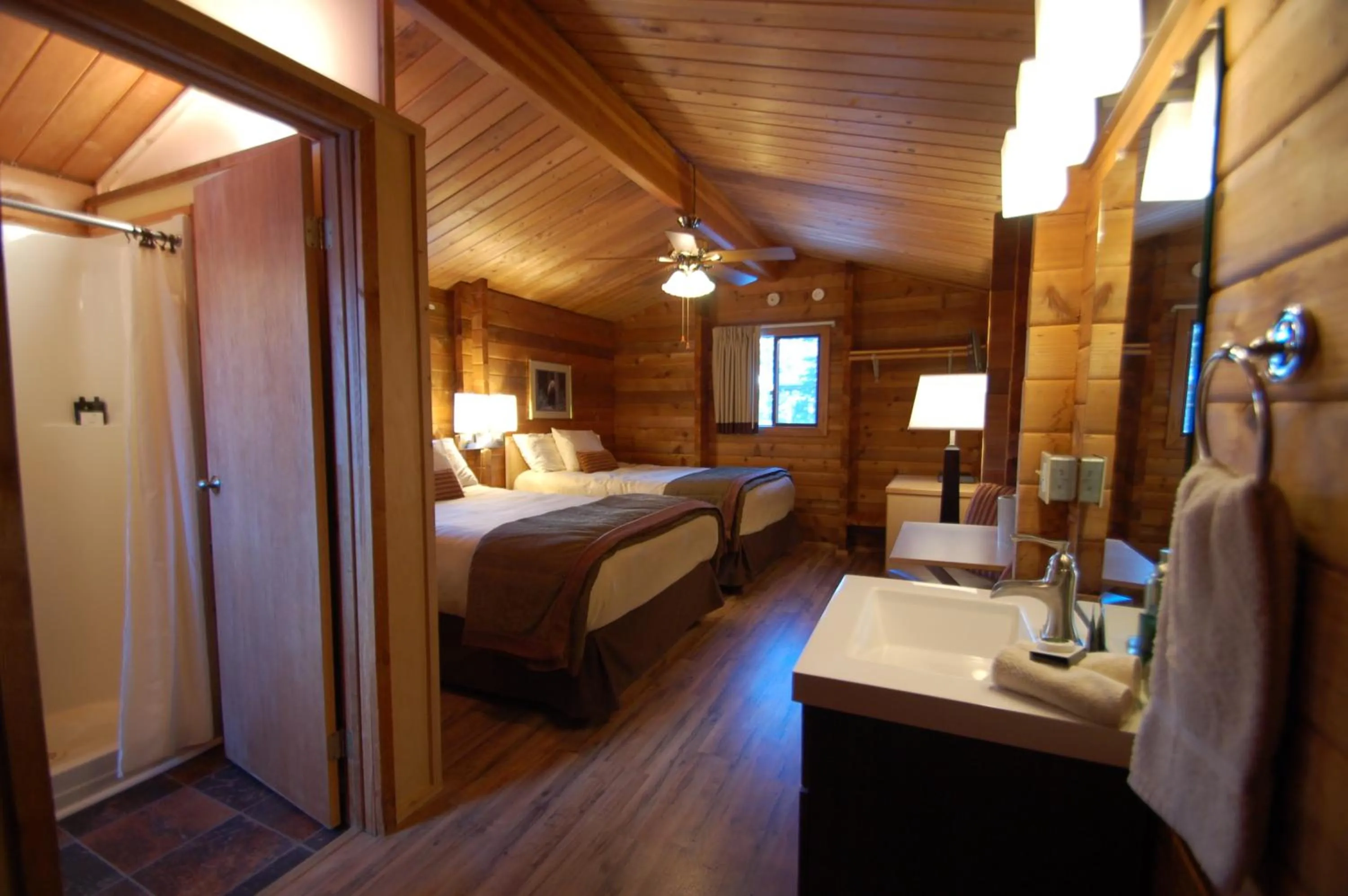 Photo of the whole room, Bed in Denali Cabins