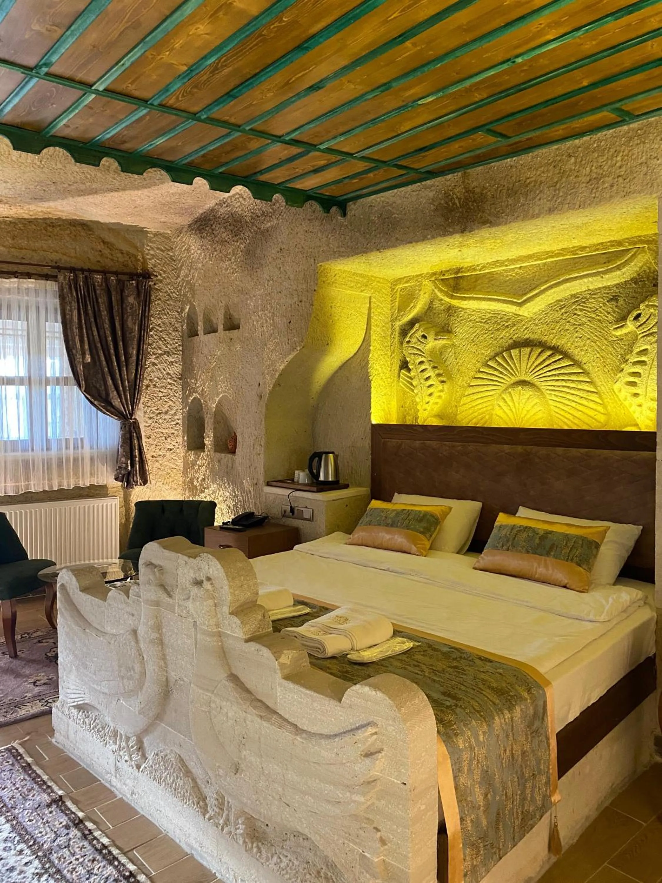 Bed in Mesken Cave Suites