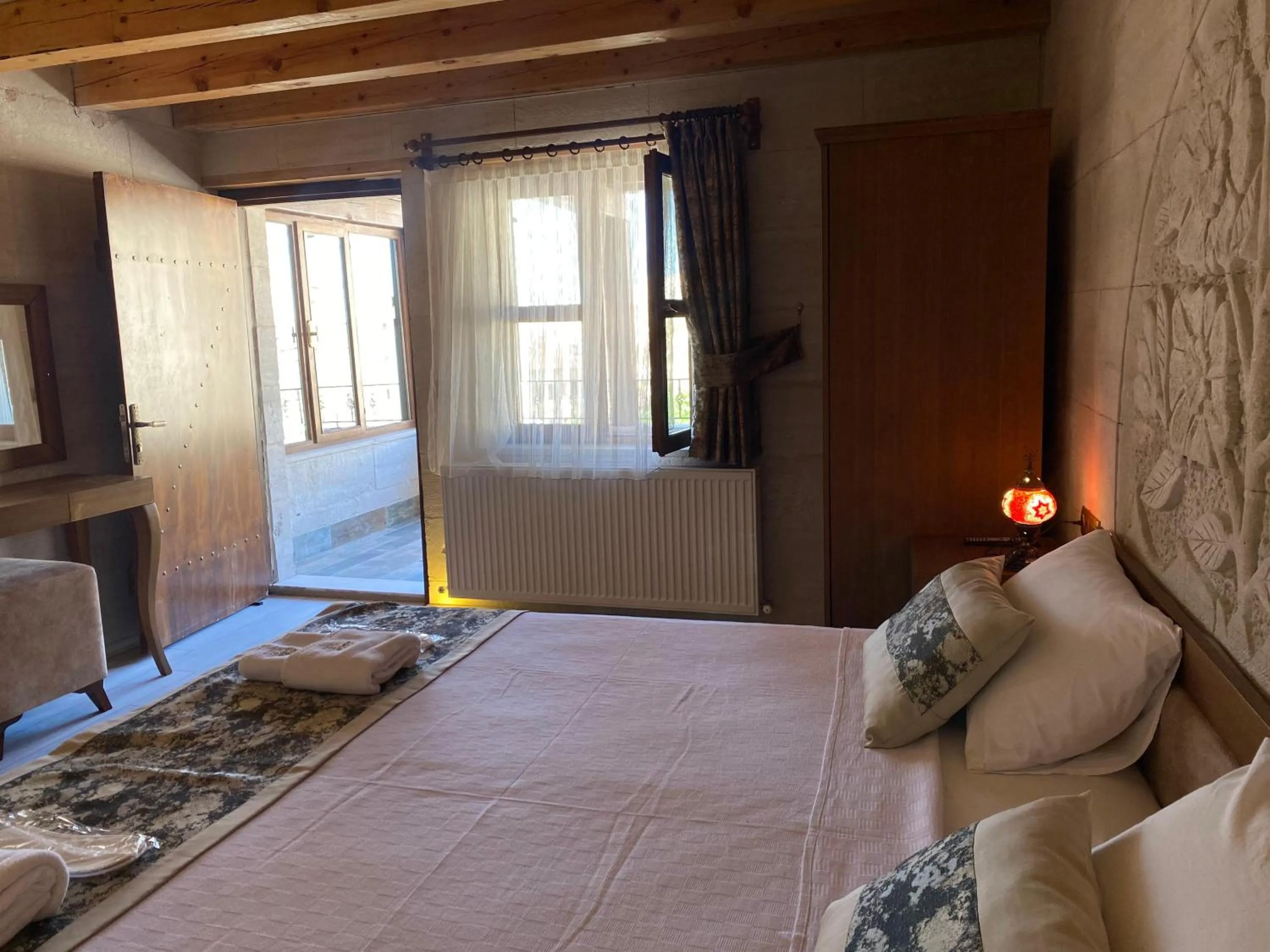 Bed in Mesken Cave Suites