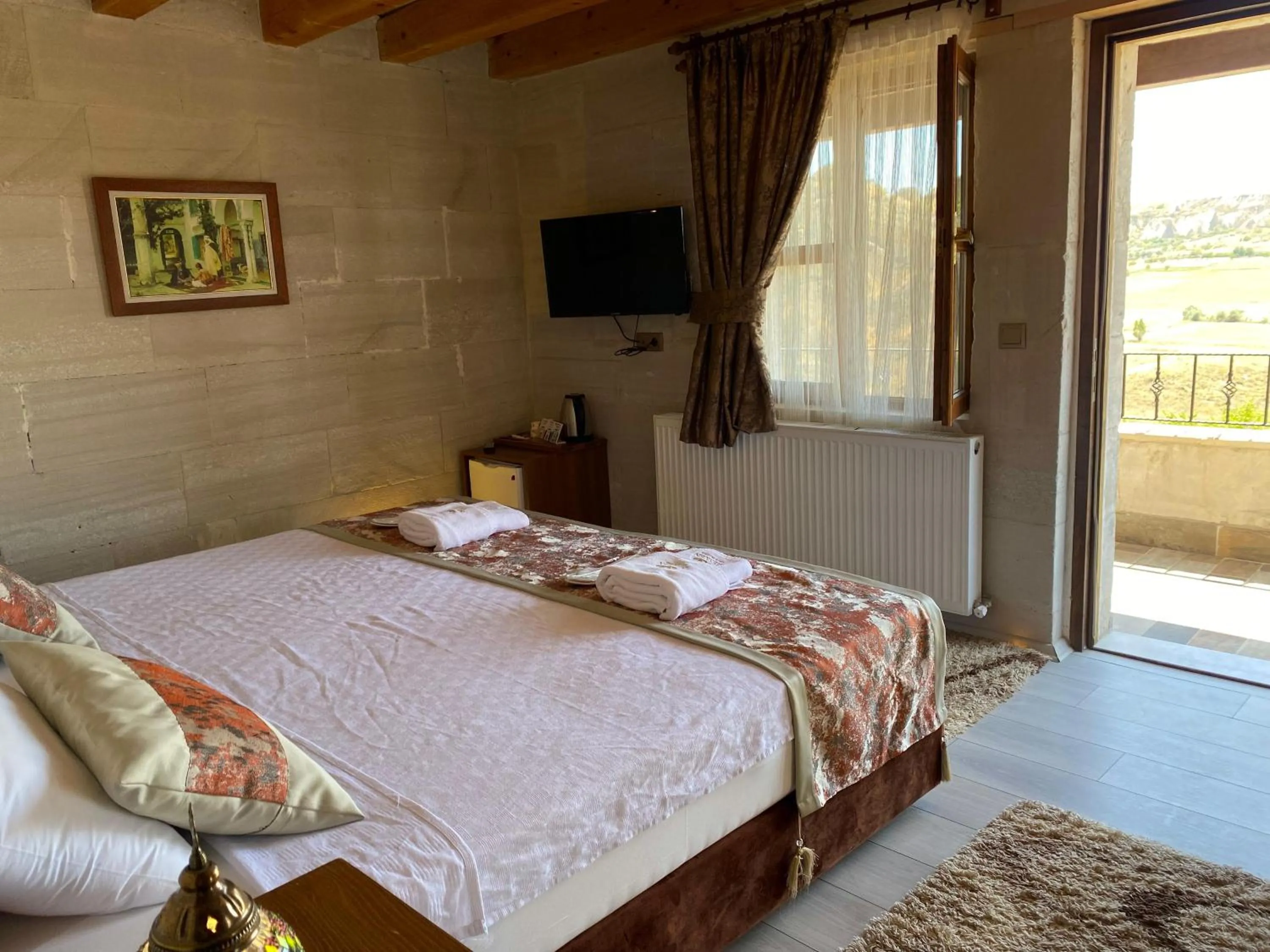 Bed in Mesken Cave Suites