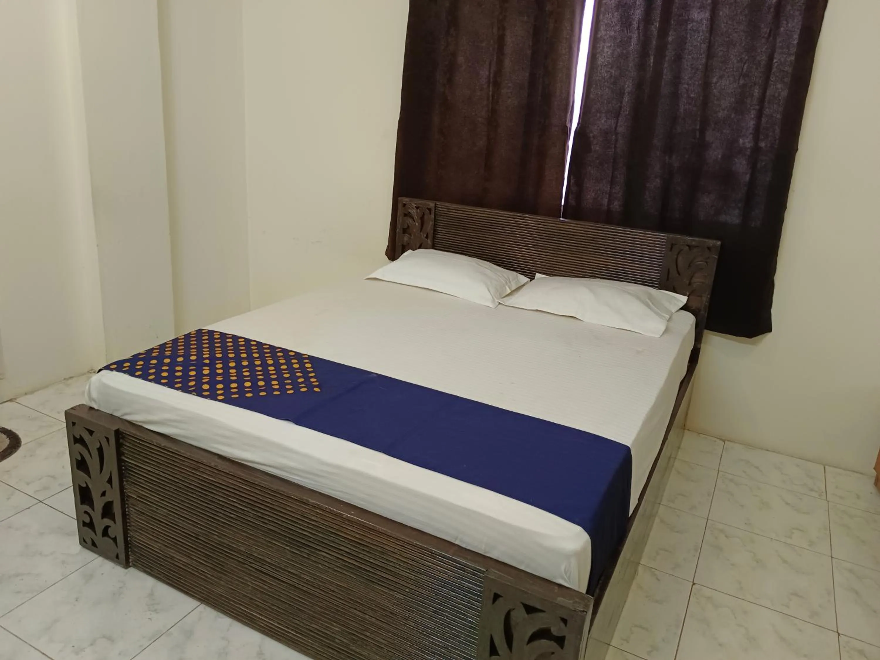 Bed in Bhavani Residency