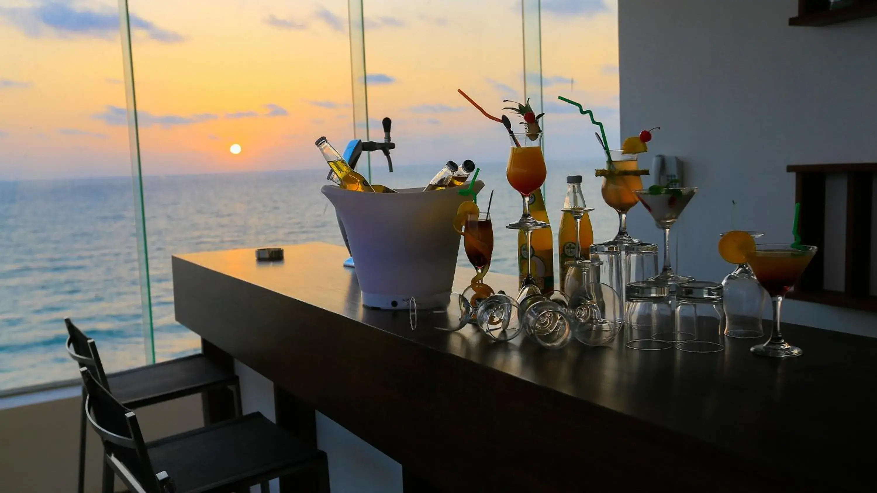 Lounge or bar in Pandanus Beach Resort & Spa Lounge or bar in Pandanus Beach Resort & Spa